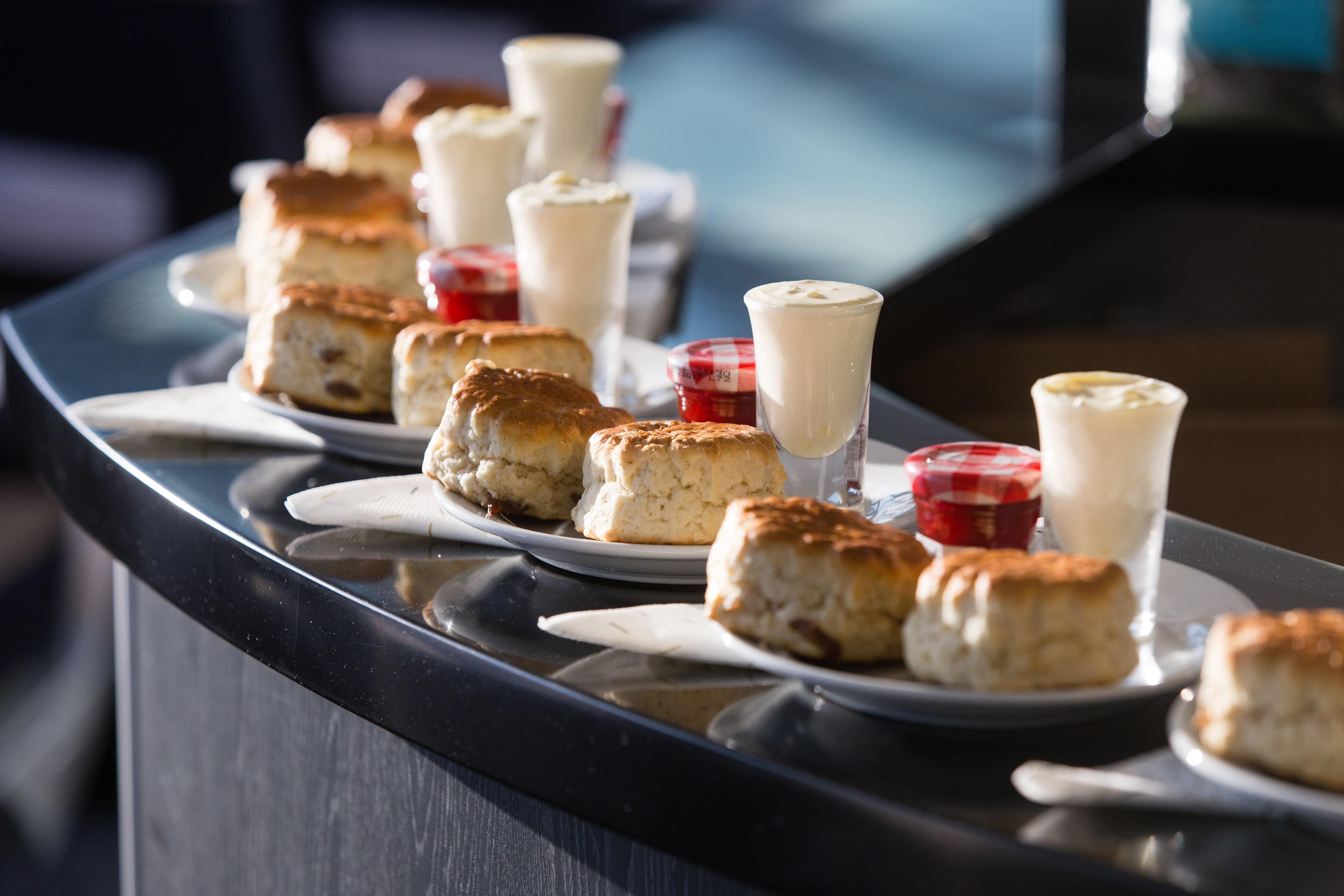 "Venus Clipper biscuits with jam and cream for a networking event catering display."