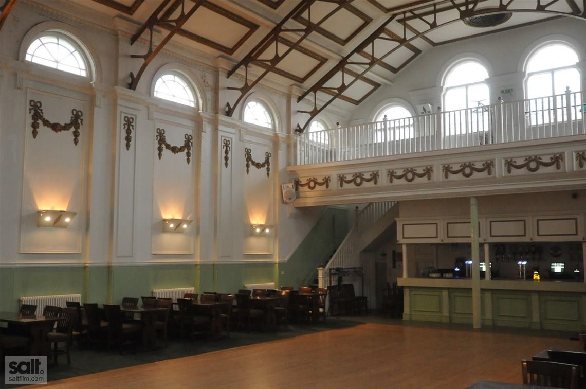 Main Hall at Hammersmith Club, spacious venue with high ceilings for events and gatherings.