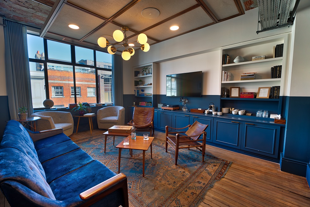 Stylish meeting space in Mortimer House with modern furnishings for creative gatherings.