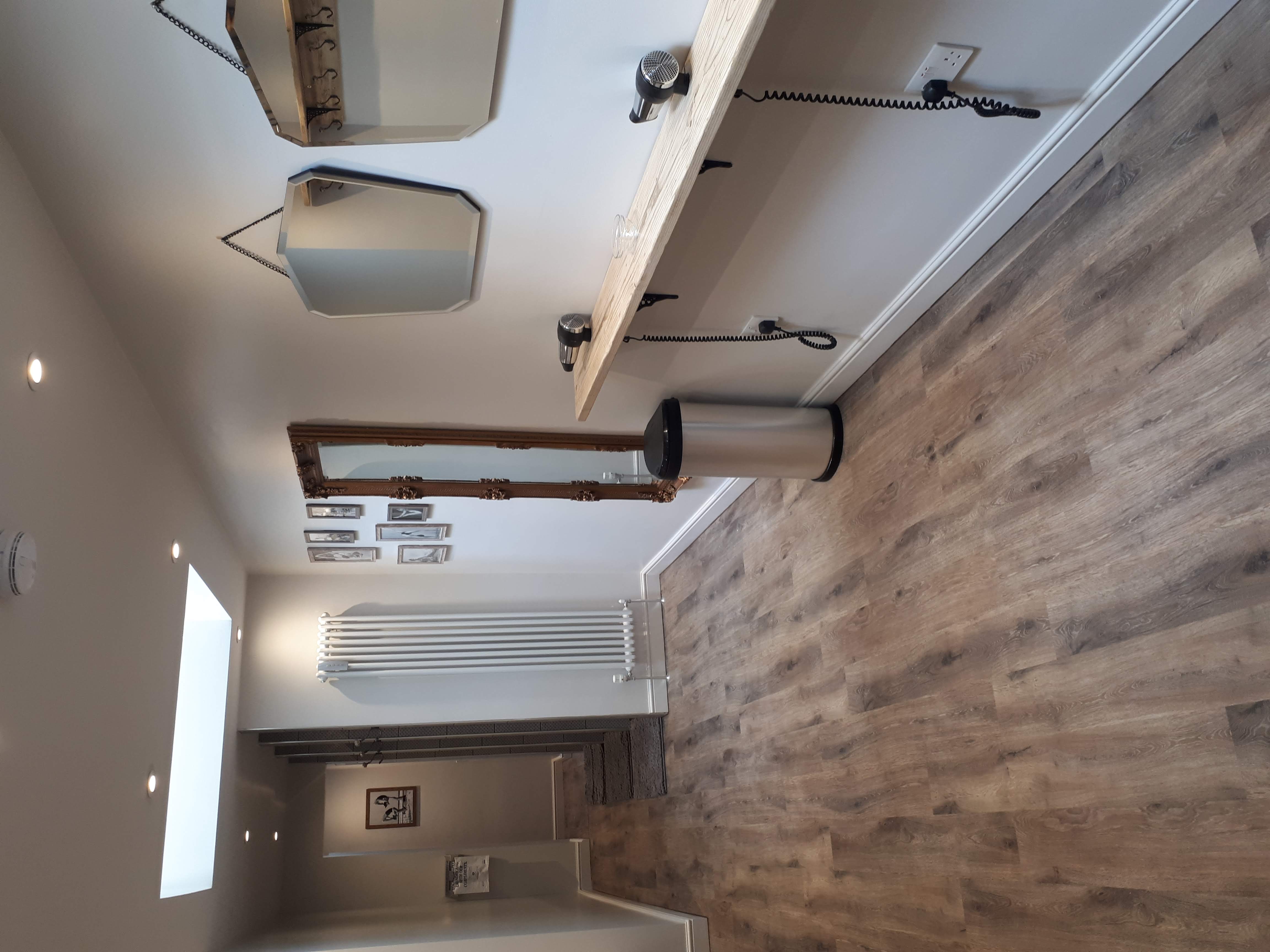 Yoga & Pilates Studio preparation area with mirrors, ideal for events and wellness sessions.