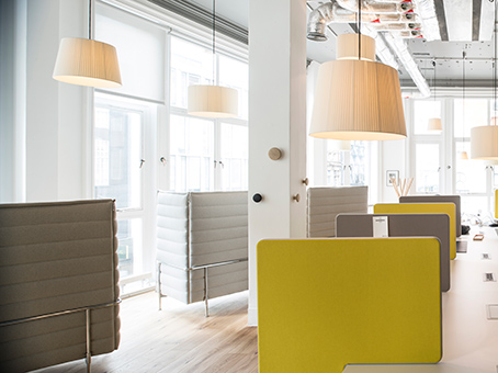 Modern open-concept workspace with soft partitions for collaborative events at Spaces Oxford Street.