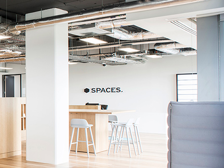 Modern open-concept workspace in Spaces Park Royal, ideal for meetings and networking events.