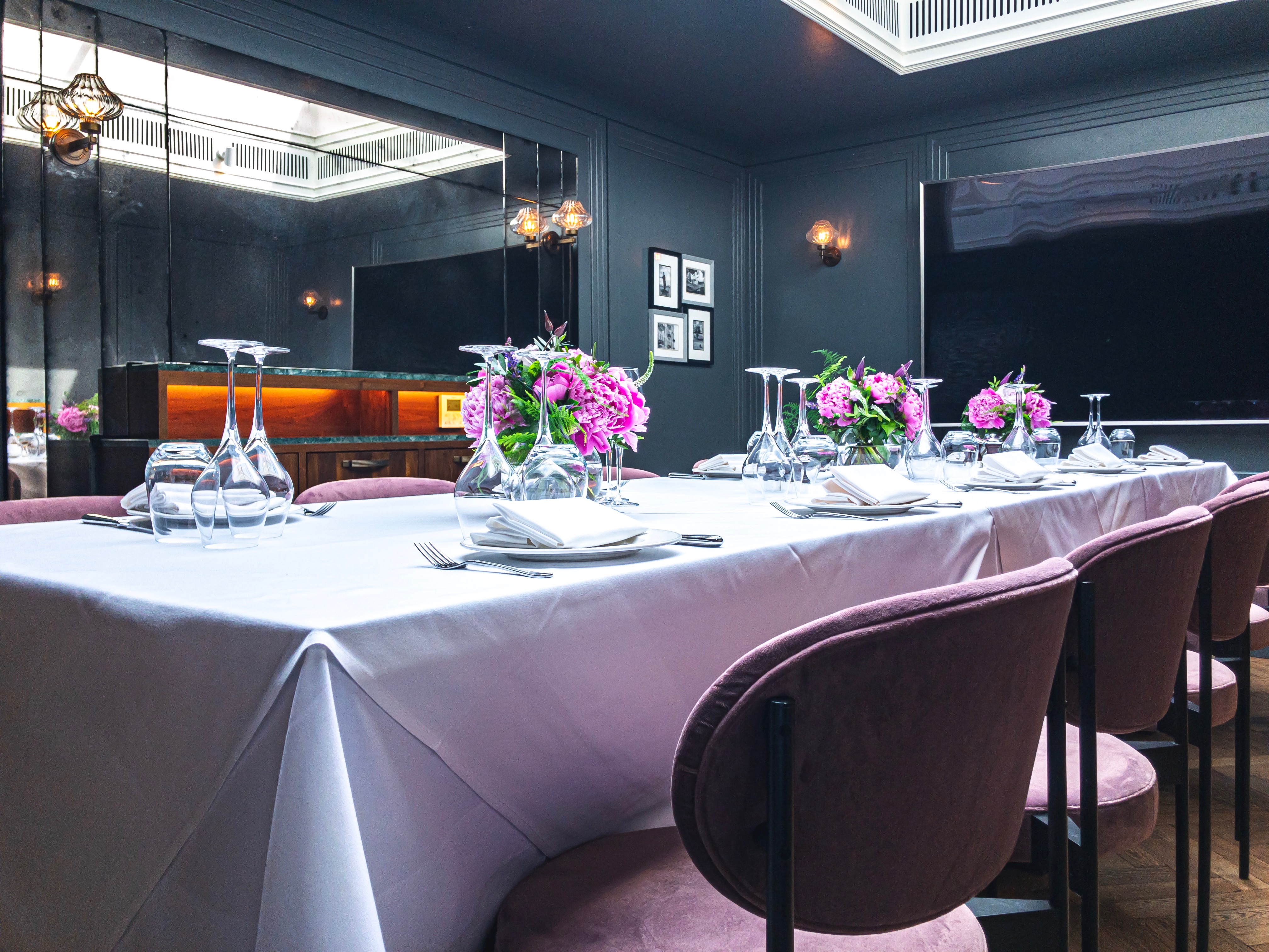 Elegant event space 'Le Petit Platanes' set for intimate corporate gatherings.