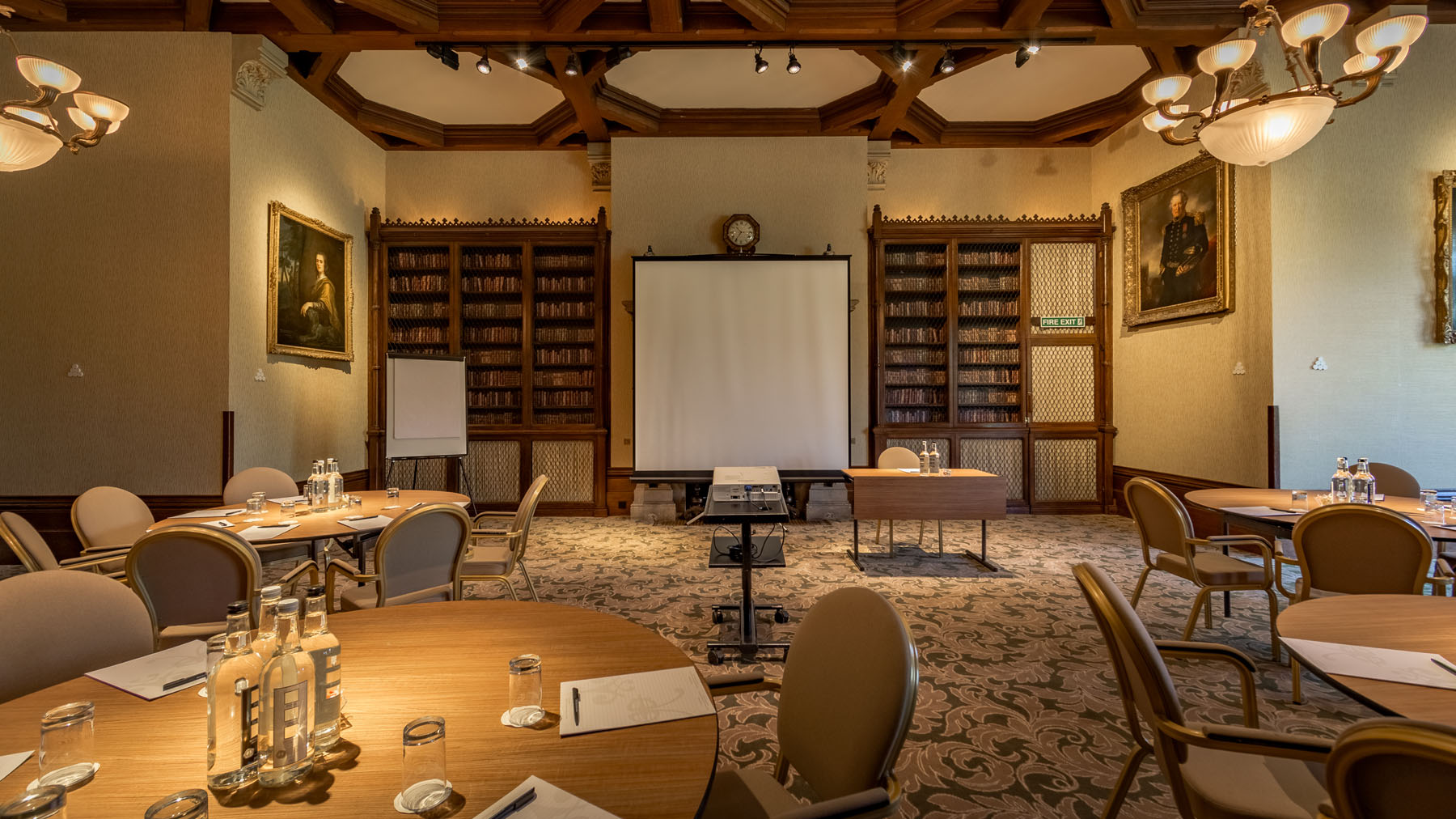 Elegant meeting room in The Elvetham, Hampshire with round tables and natural light.