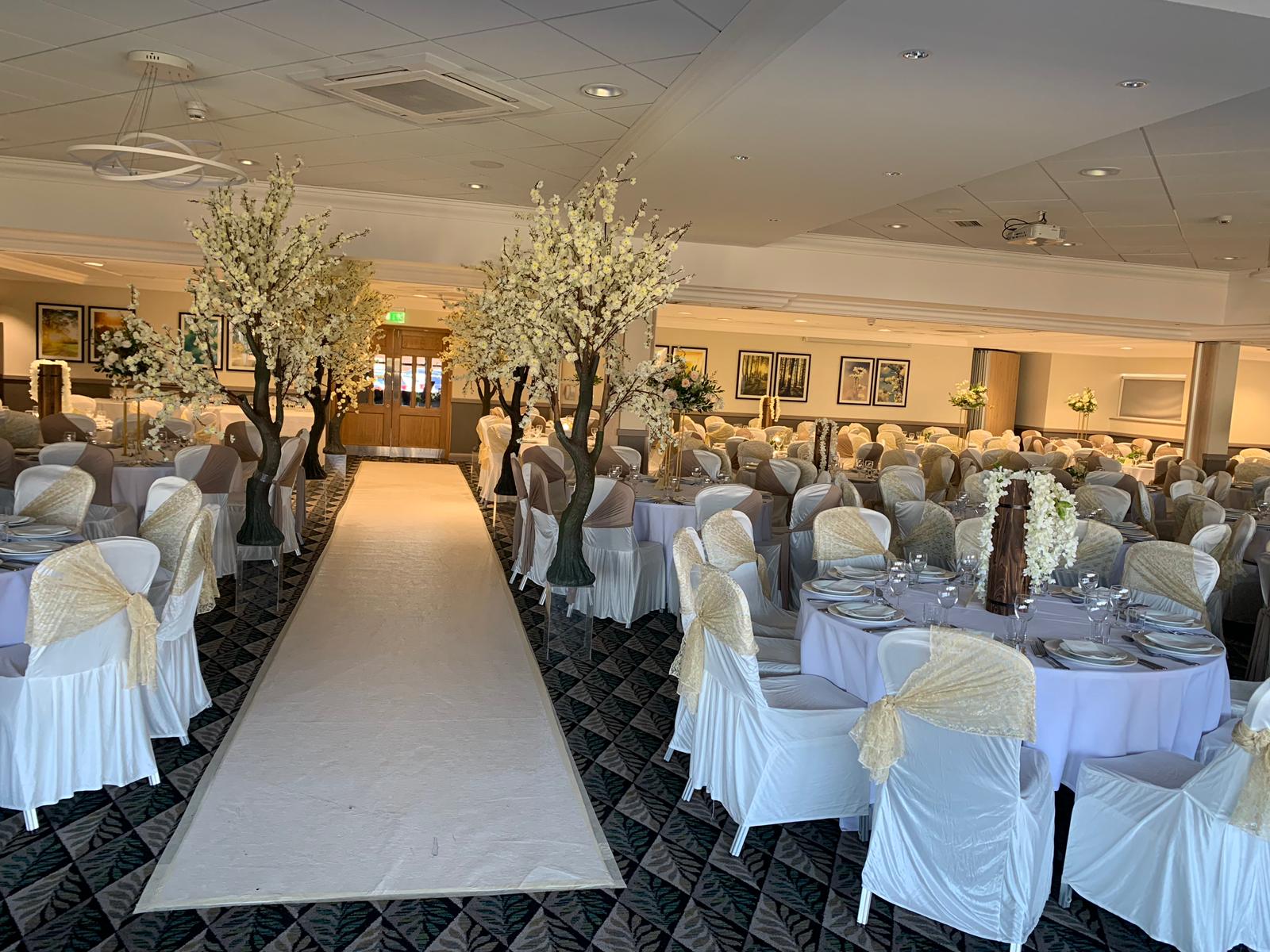 Elegant event space at Holiday Inn Leicester with round tables, ideal for weddings and corporate events.