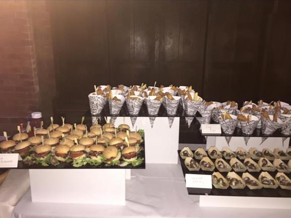 Mini burgers and gourmet snacks display for networking event at Holiday Inn Leicester.