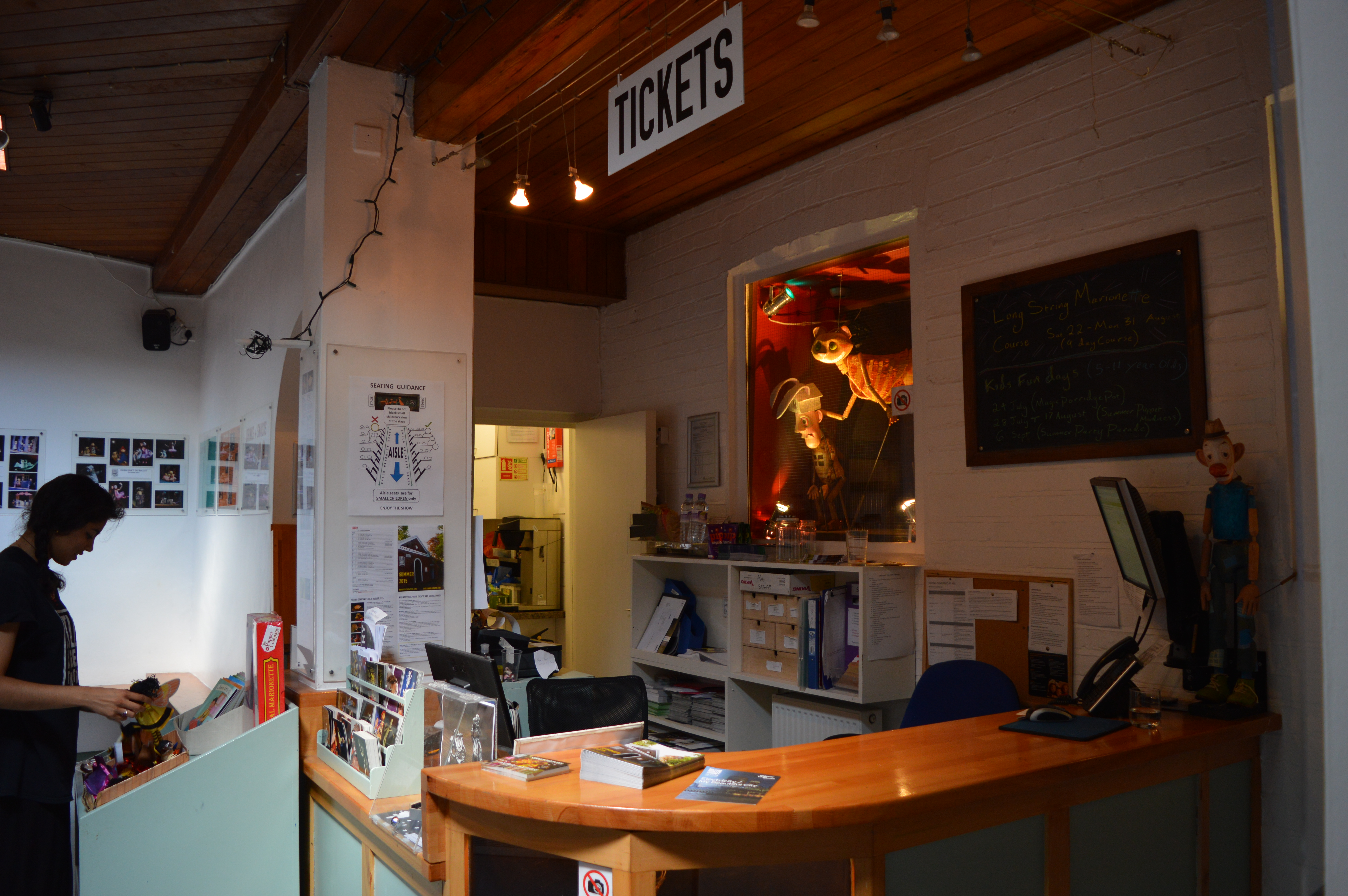 Little Angel Theatre ticketing counter, organized space for events and meetings.