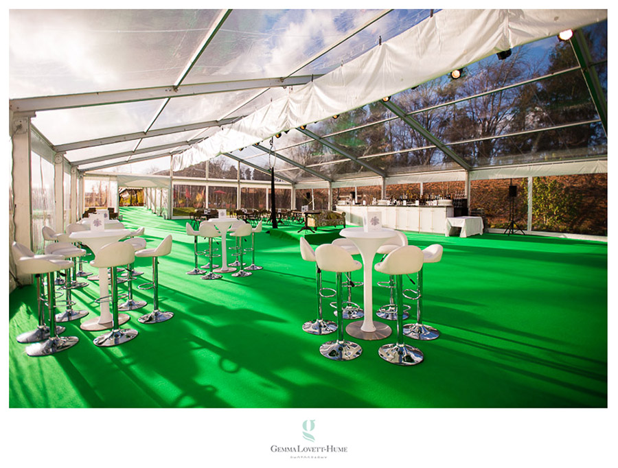 Elegant marquee with green carpet at The Alnwick Garden for events and gatherings.