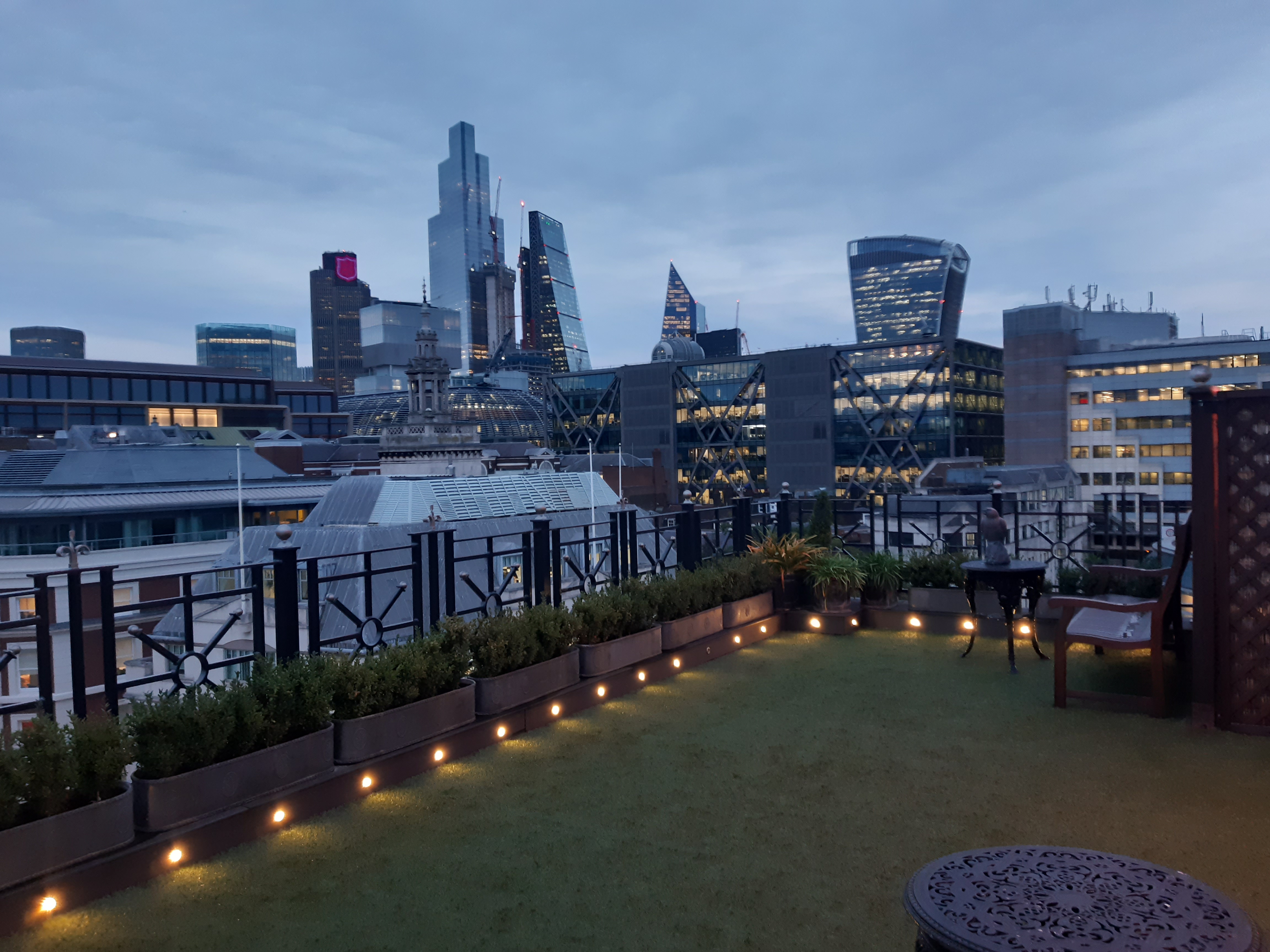 Rooftop venue at Vintners' Hall with city skyline, ideal for networking events and receptions.