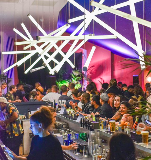 Vibrant bar scene at EartH, perfect for networking events and social gatherings.