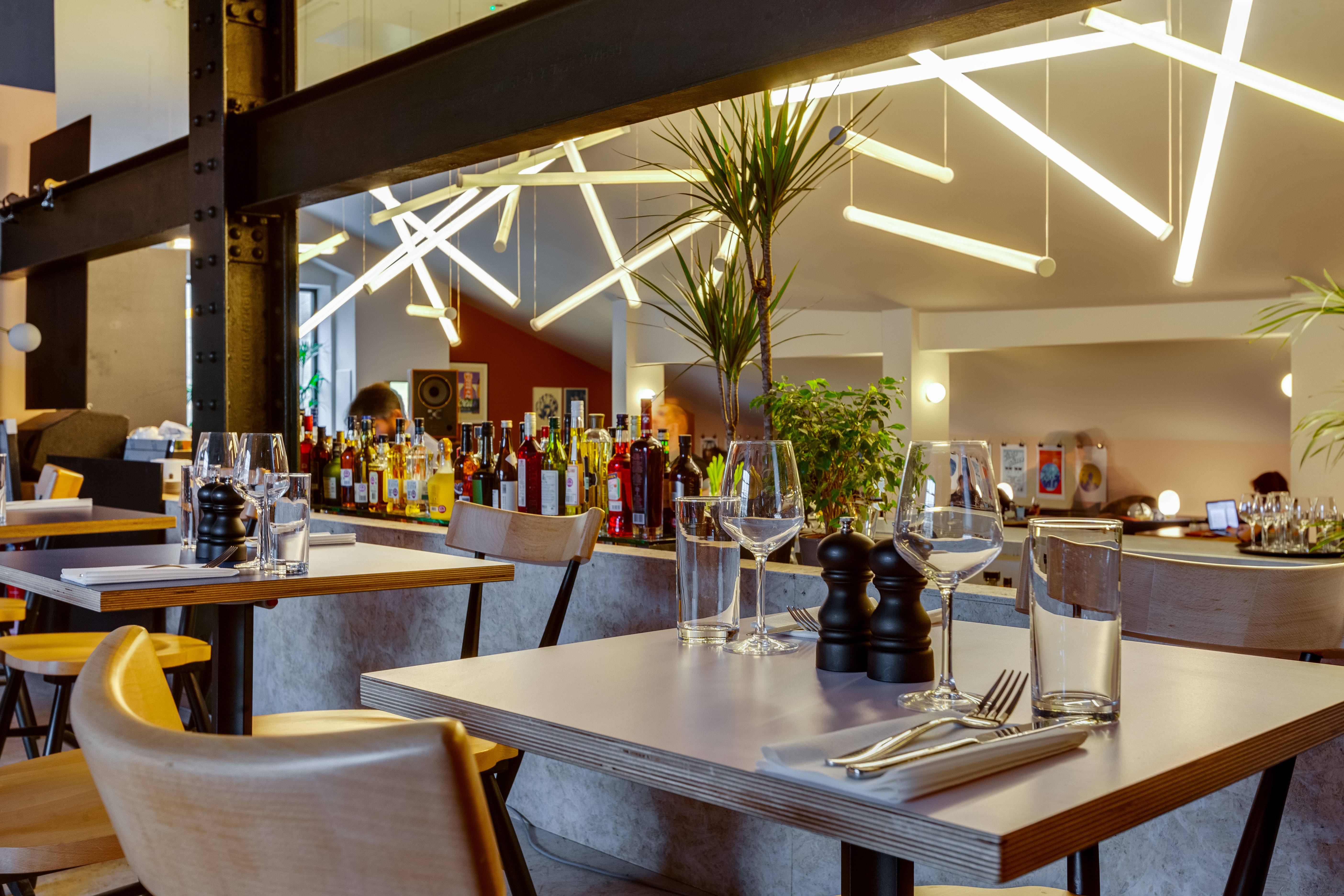 Modern dining space at Bar + Kitchen, ideal for intimate events and networking.