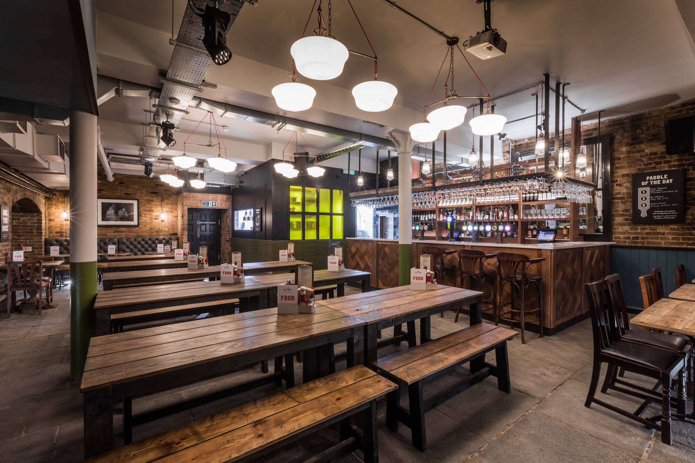 Spacious Beer Hall in Draft House Farringdon, ideal for gatherings and networking events.
