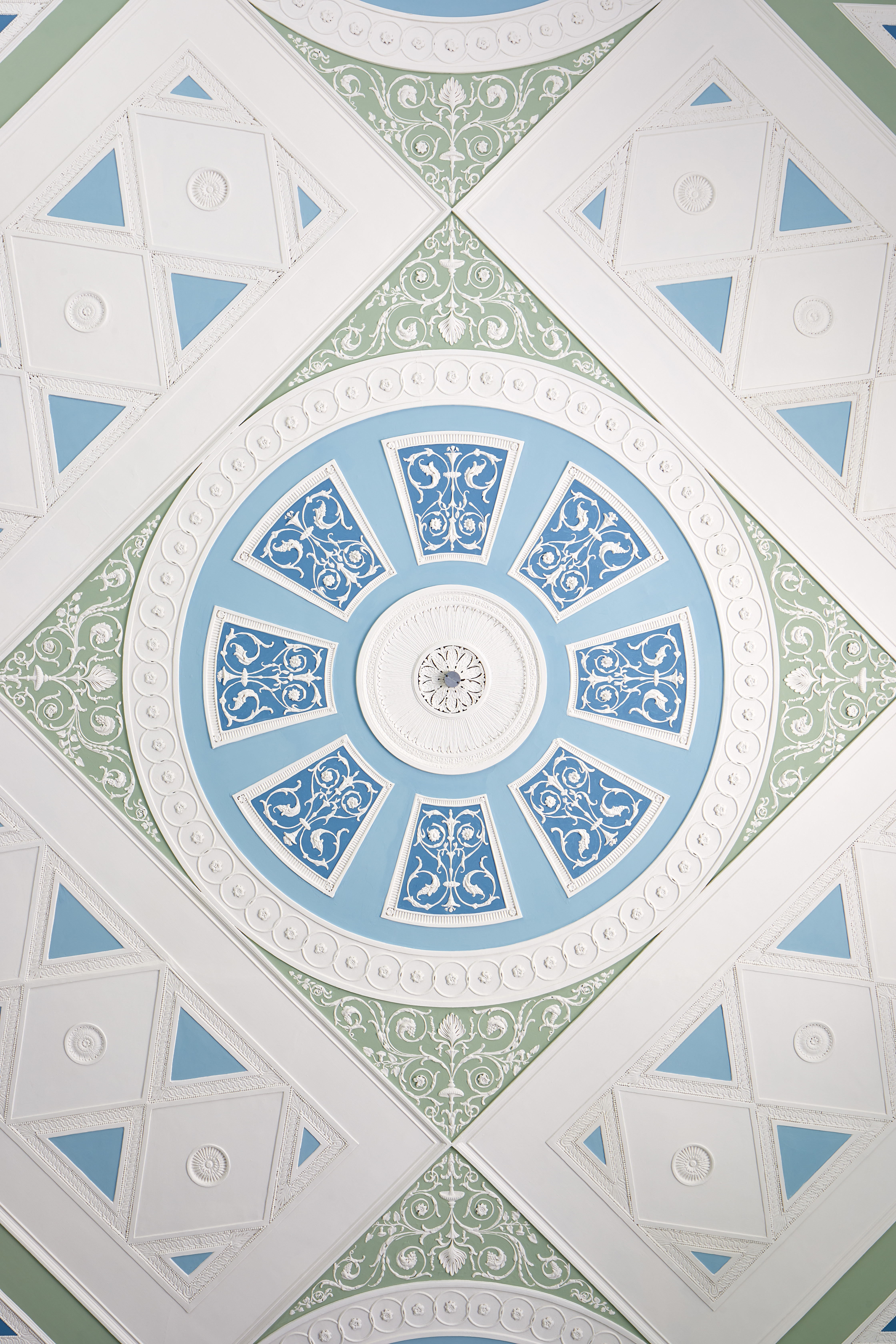 Georgian Eating Room ceiling with circular motif, perfect for upscale events and meetings.