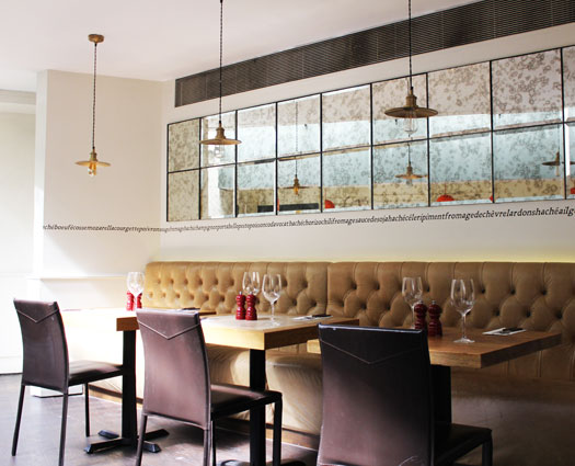 Stylish dining area in Hache Holborn, ideal for corporate dinners and networking events.