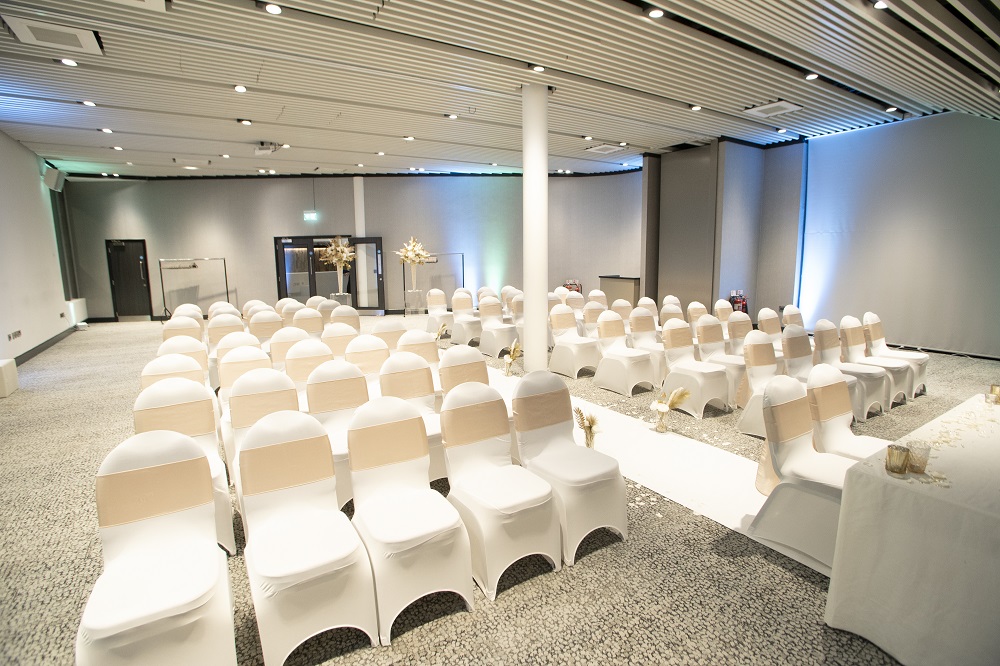 Elegant event space at Pier Eight Room, The Lowry, ideal for ceremonies and presentations.