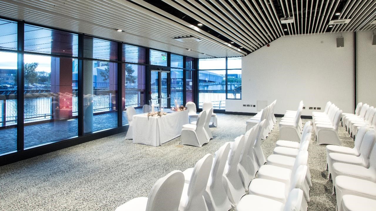 Modern event space at Pier Eight Room, featuring natural light and versatile setups.