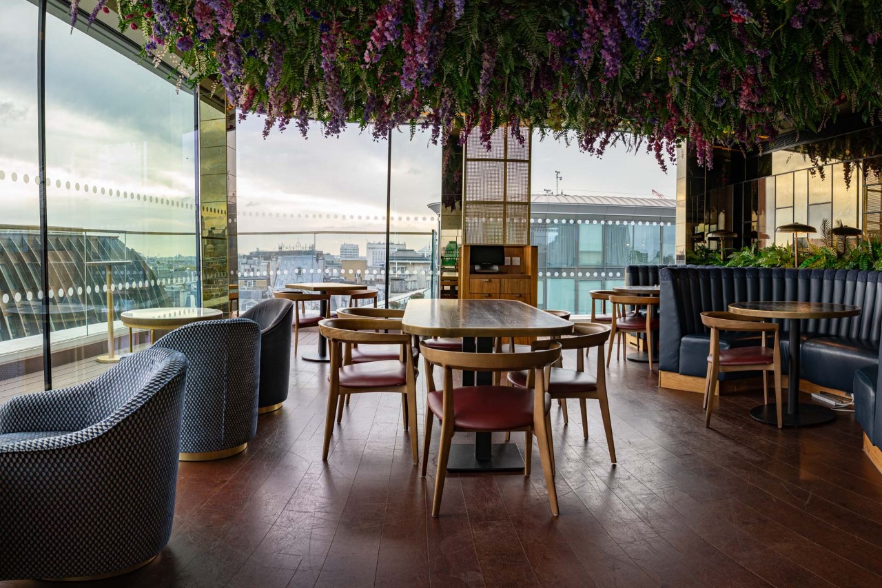 Stylish event space at The View @LSQ with floral ceiling, perfect for upscale gatherings.