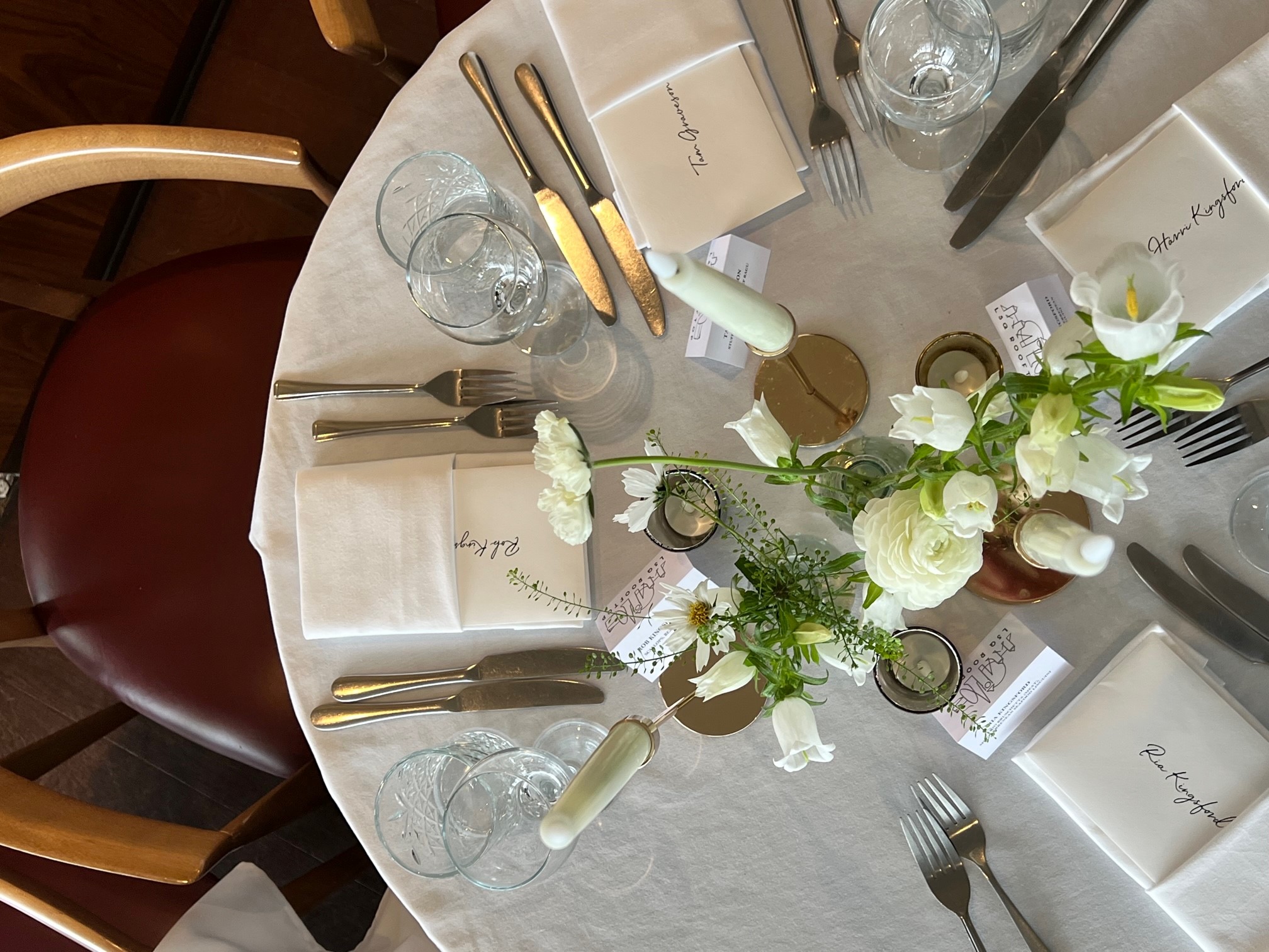 Elegant dining table with floral centerpieces at The View @LSQ for special events.