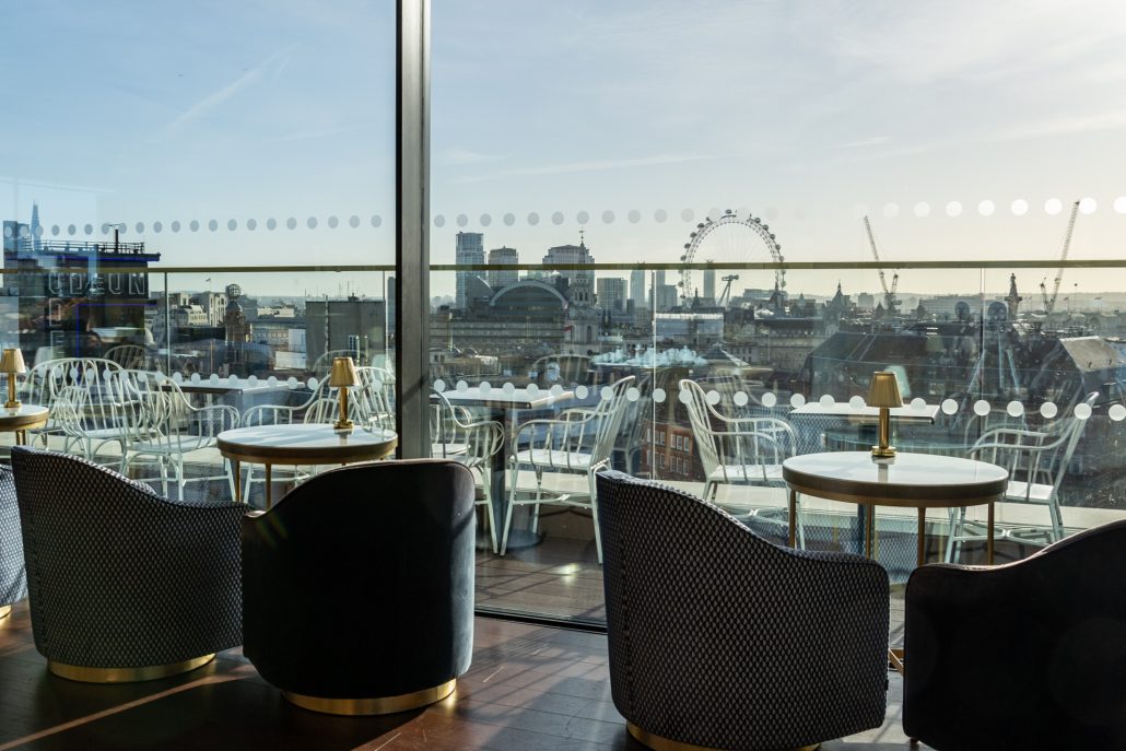 Stylish LSQ Rooftop event space with city skyline view, perfect for networking and receptions.