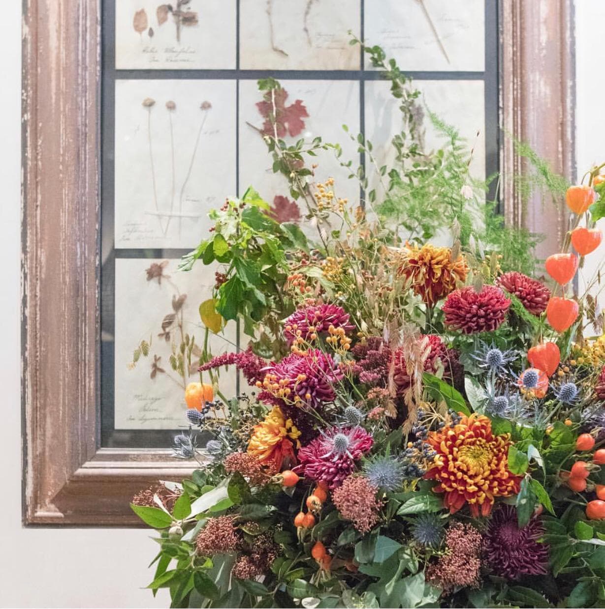 Vibrant floral arrangement at La Goccia, enhancing event elegance and atmosphere.