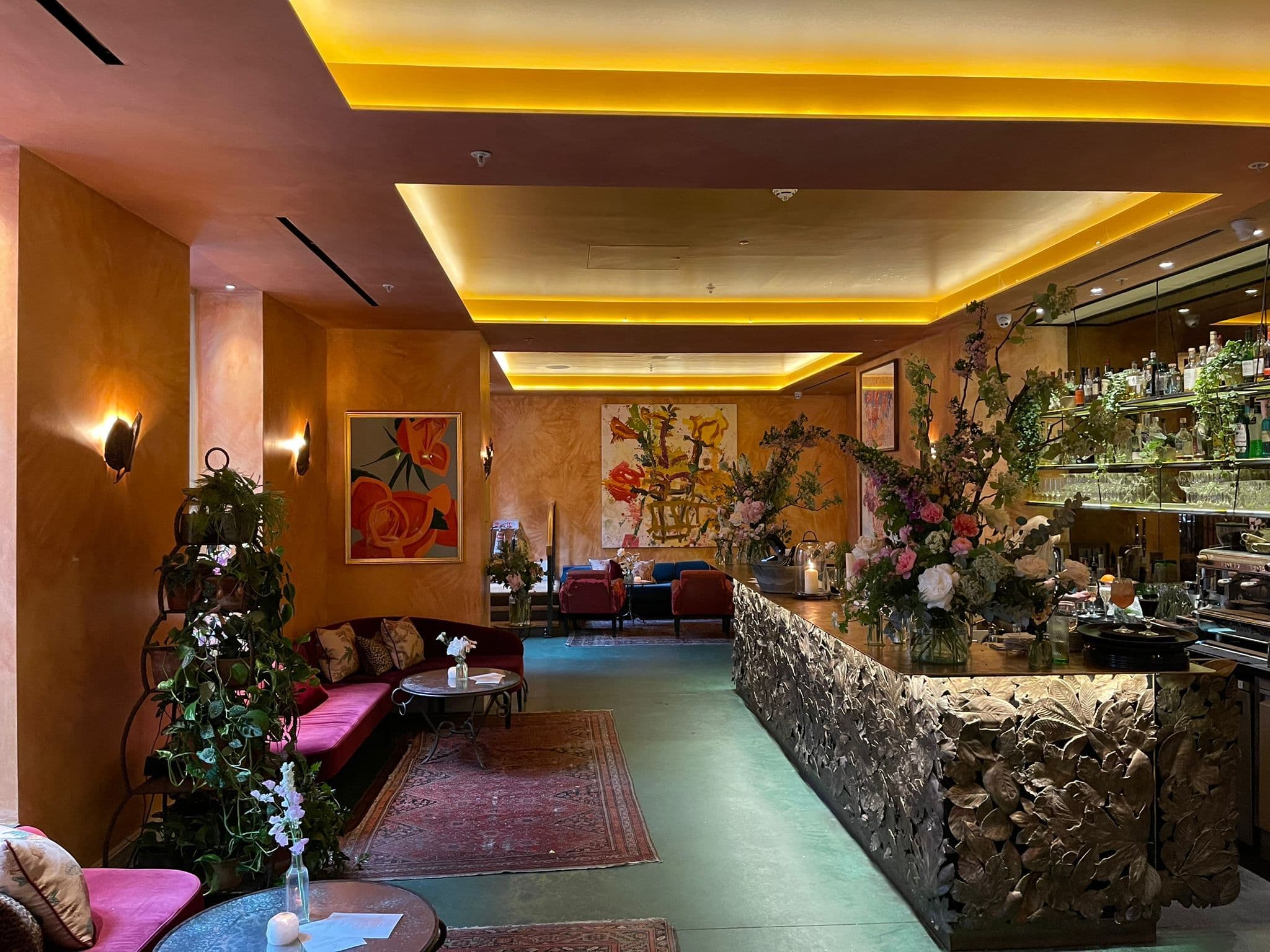 Stylish La Goccia venue with floral decor, perfect for upscale events and gatherings.