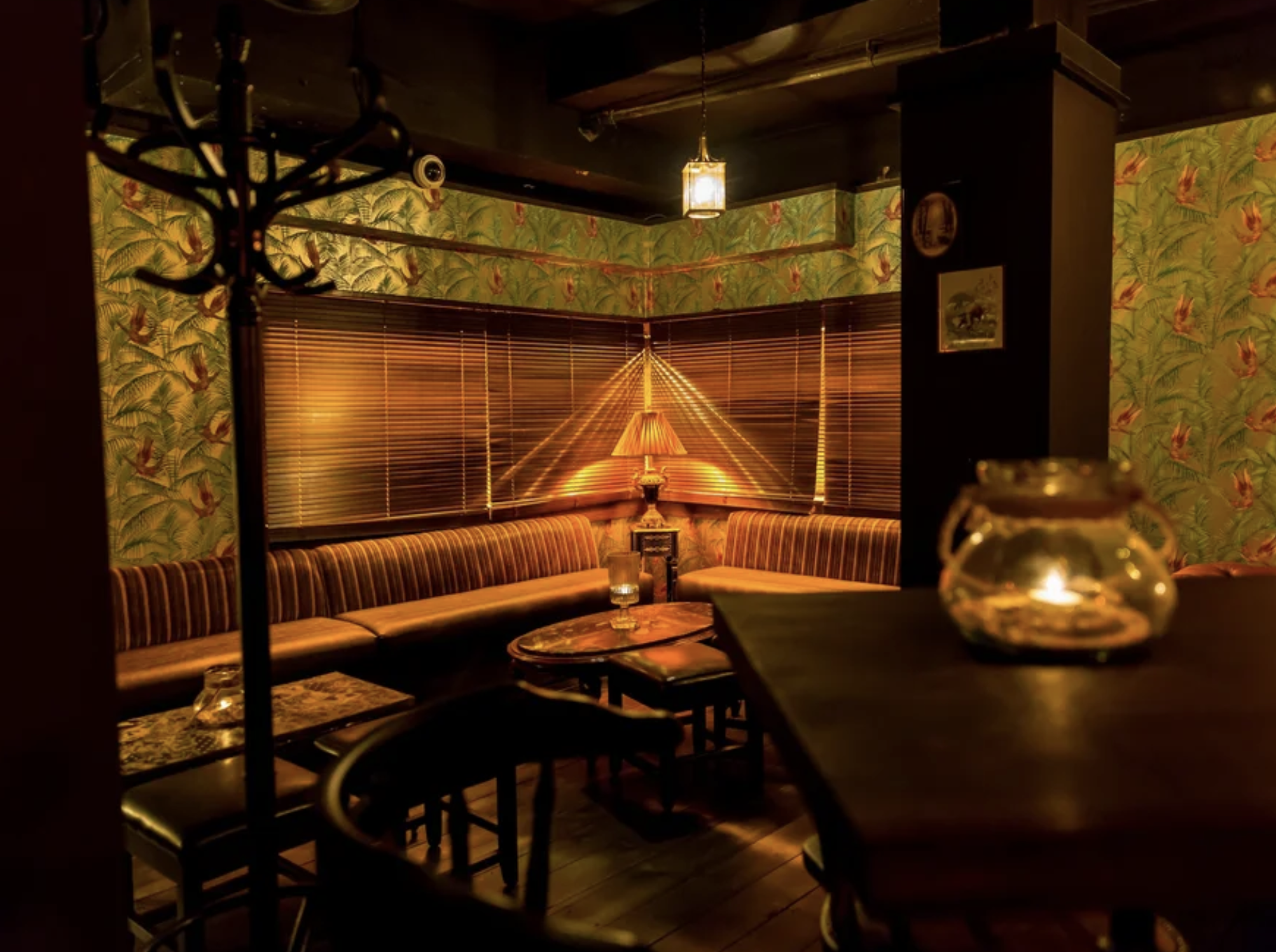 Cozy meeting space in Burlock London with elegant decor, ideal for gatherings and discussions.