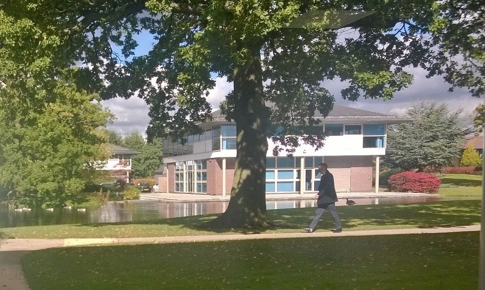 Arkwright Suite: modern venue with lush greenery for corporate retreats and team-building events.