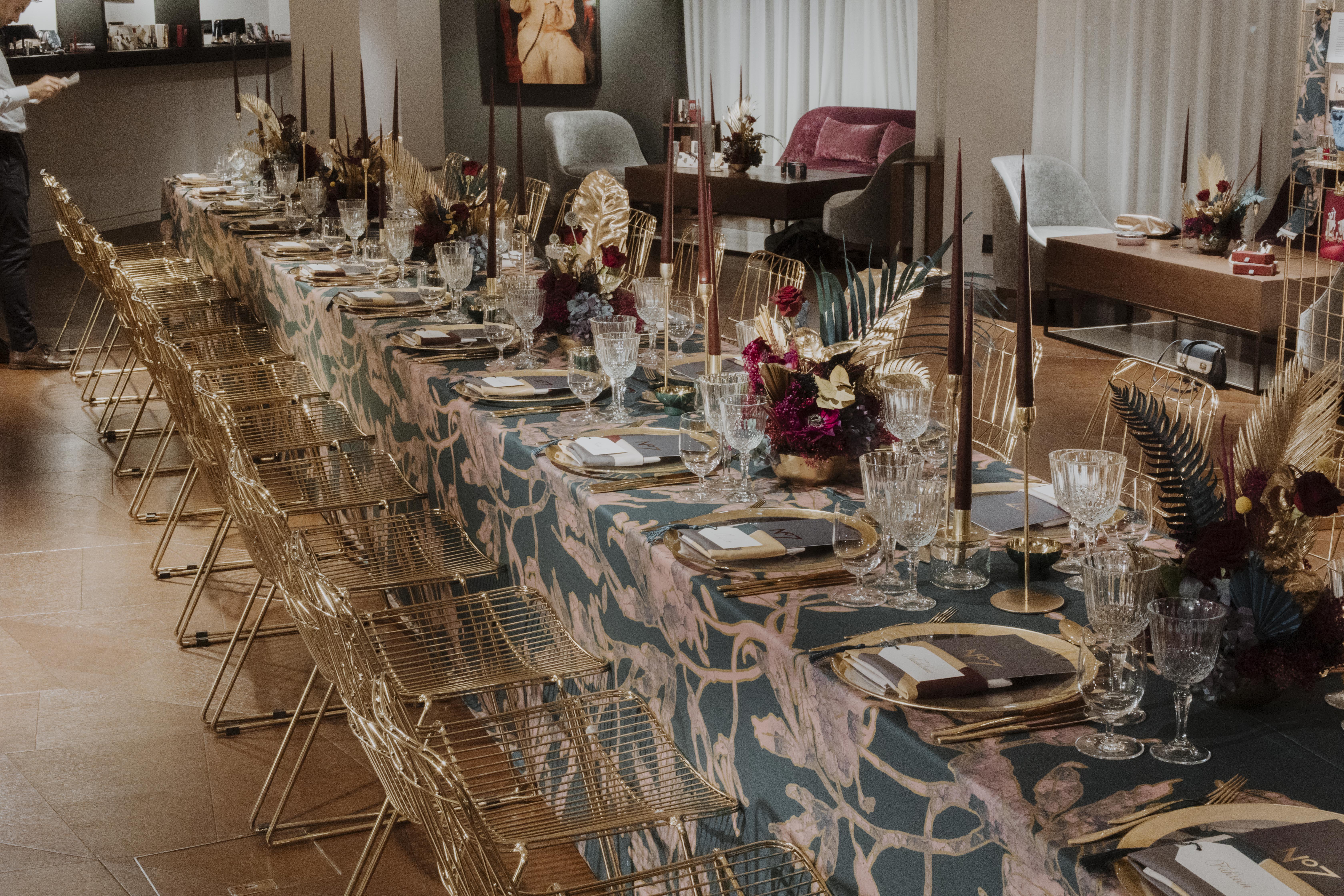 Elegant dining table with gold-accented chairs for upscale events at The Lounge, 12 Hay Hill.