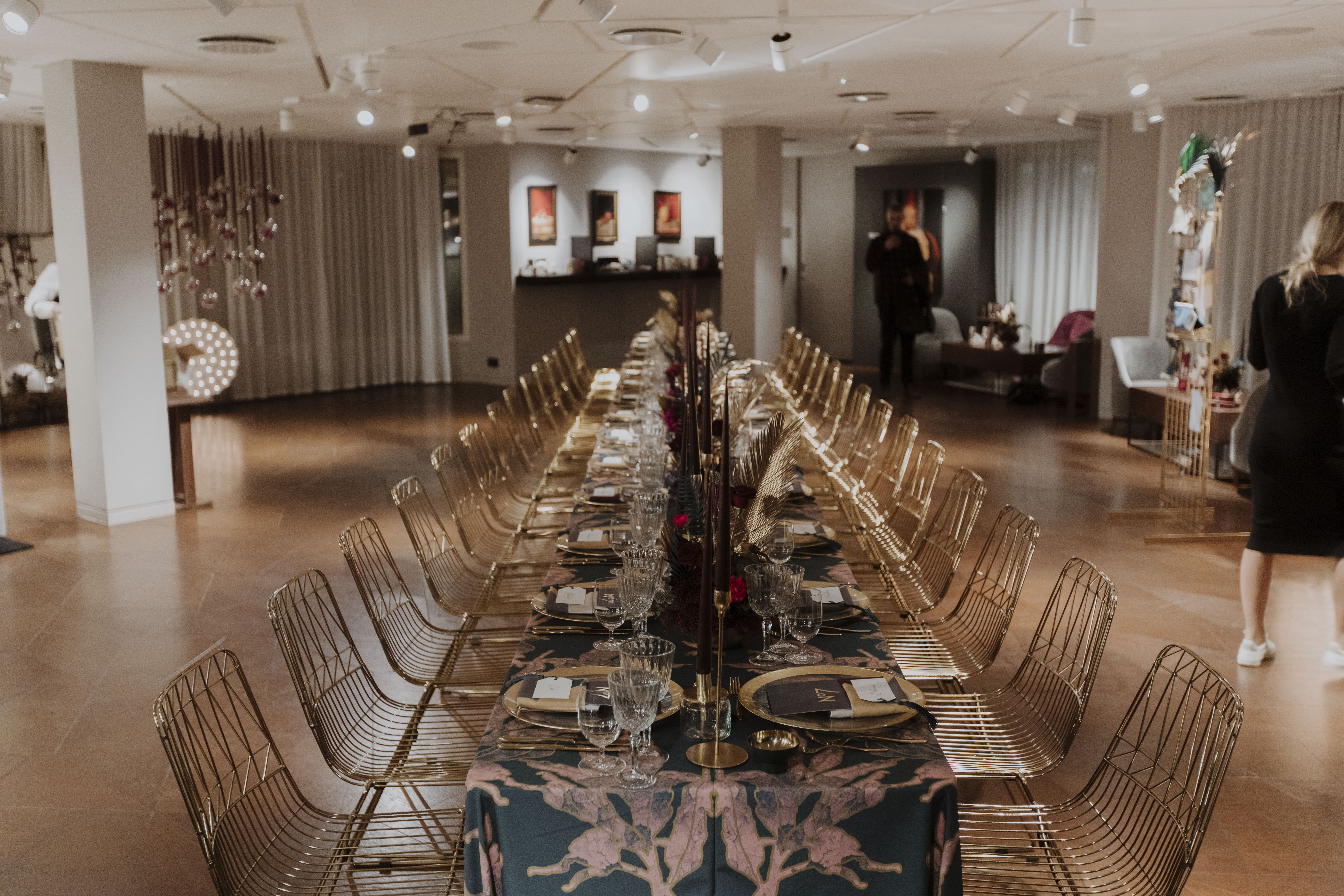 Elegant dining setup with floral centerpieces for upscale events at The Lounge, 12 Hay Hill.