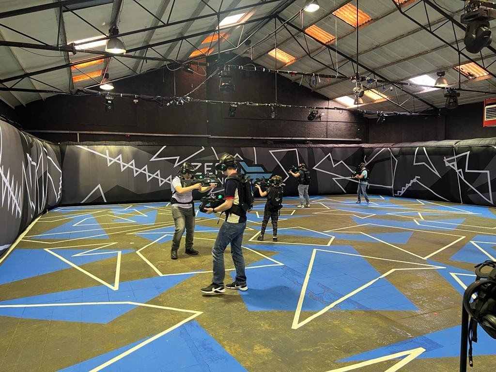 Dynamic event space SS1 in Digbeth with vibrant geometric floor for team-building activities.