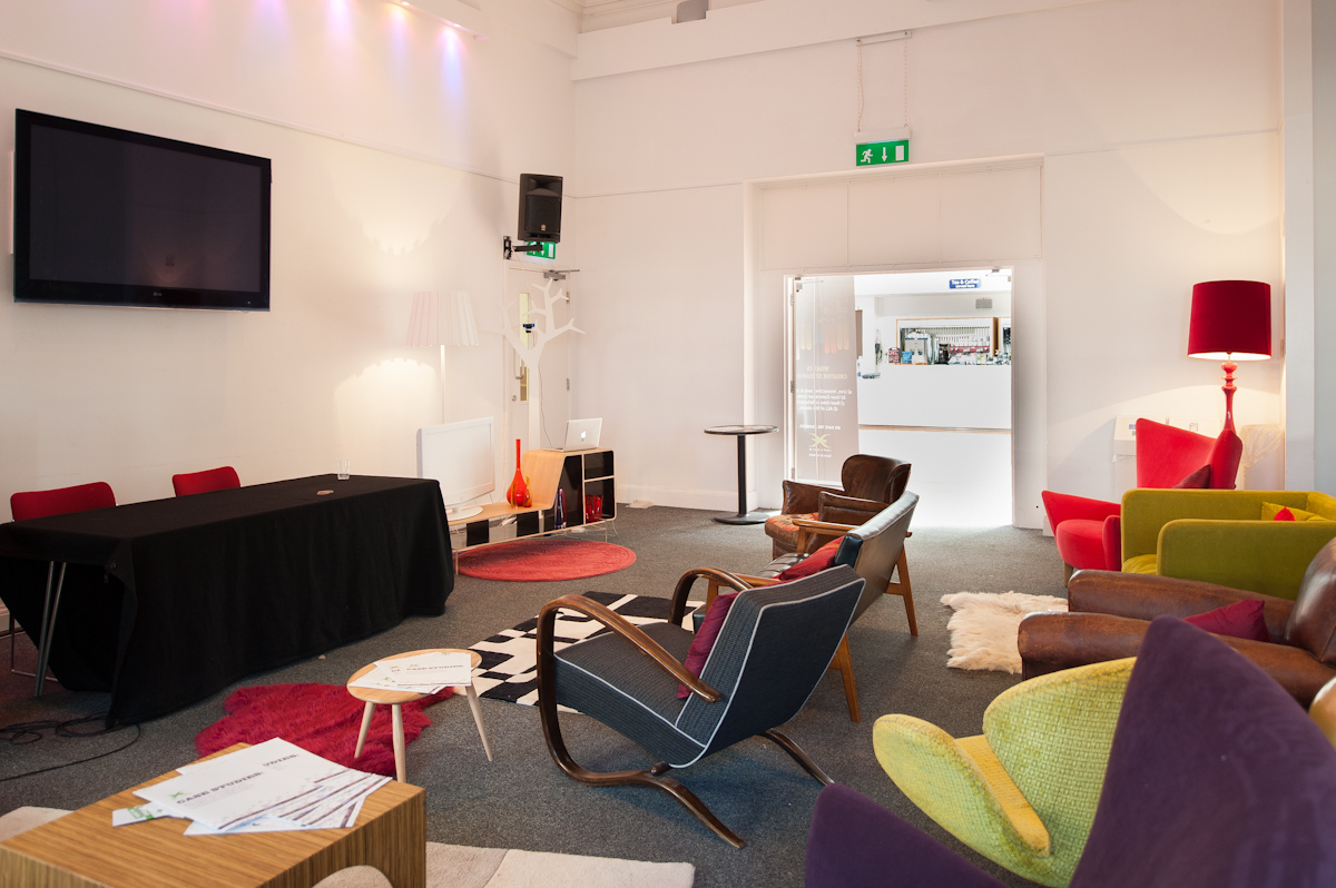 Brighton Dome Foyer Bar: modern meeting space with vibrant decor for creative events.
