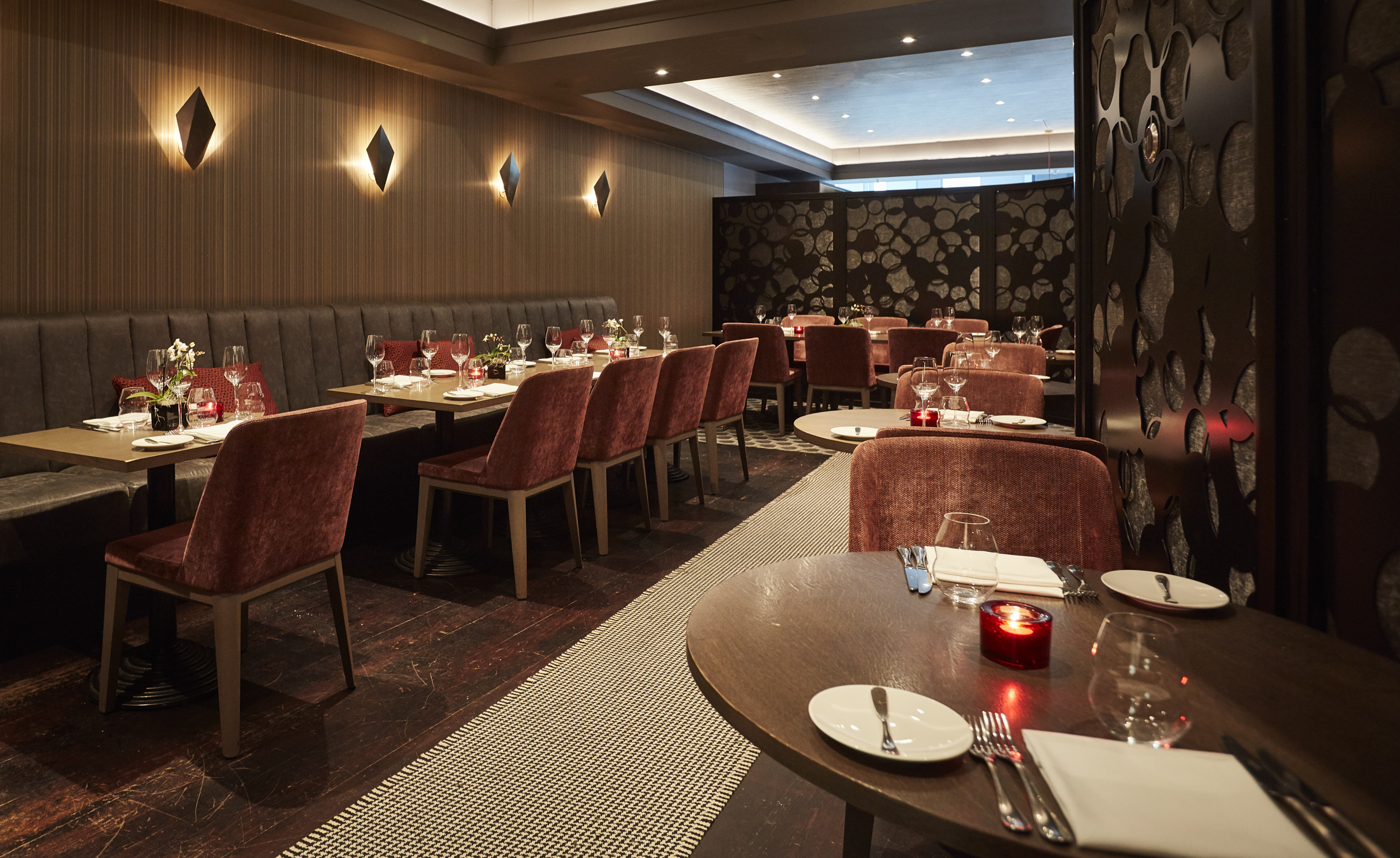 WAGYU ROOM dining space with plush seating for intimate corporate events and networking dinners.