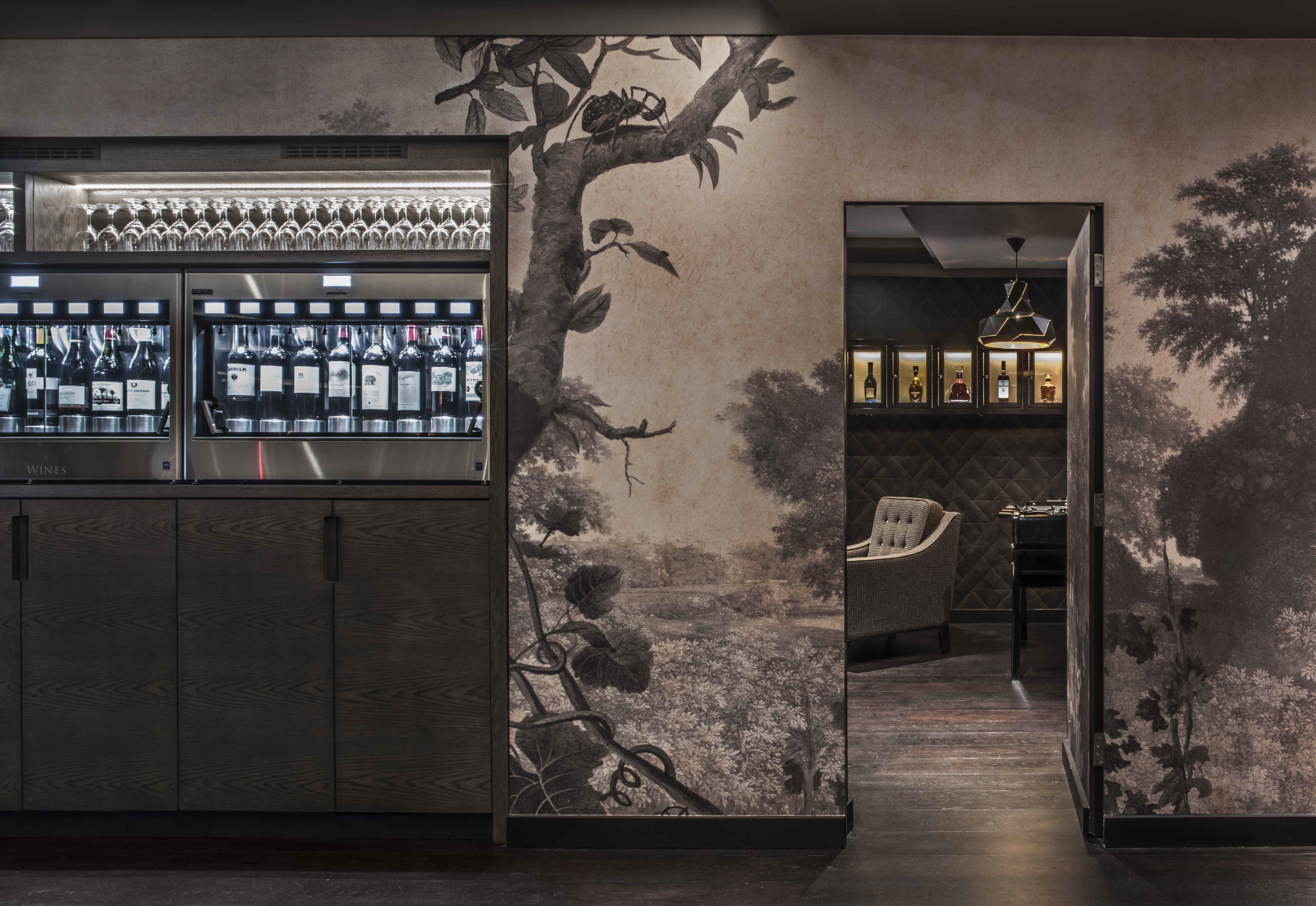 Elegant locker room venue with wine display, perfect for upscale events and gatherings.