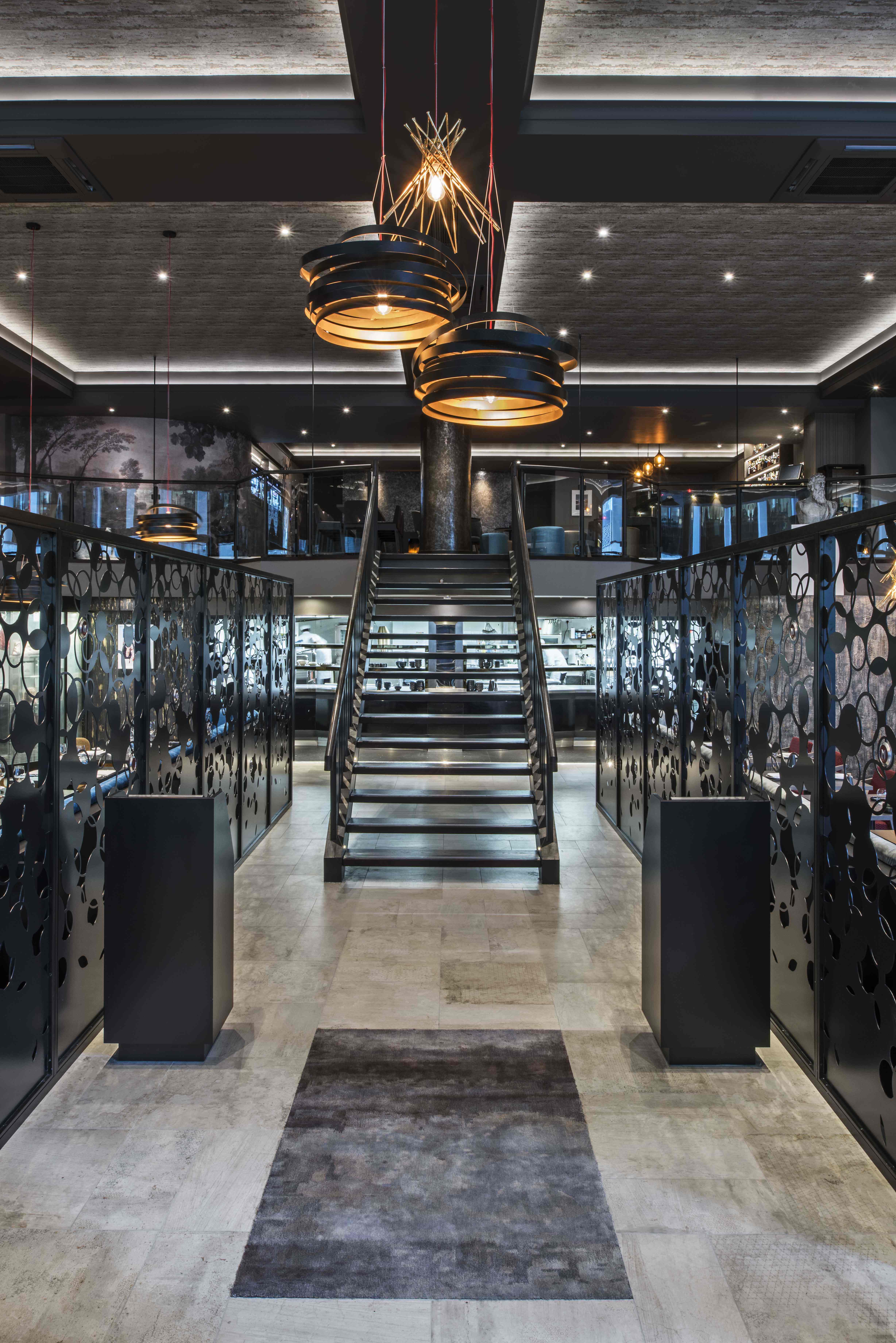 Modern GRILL venue on M Threadneedle Street with striking staircase, ideal for upscale events.