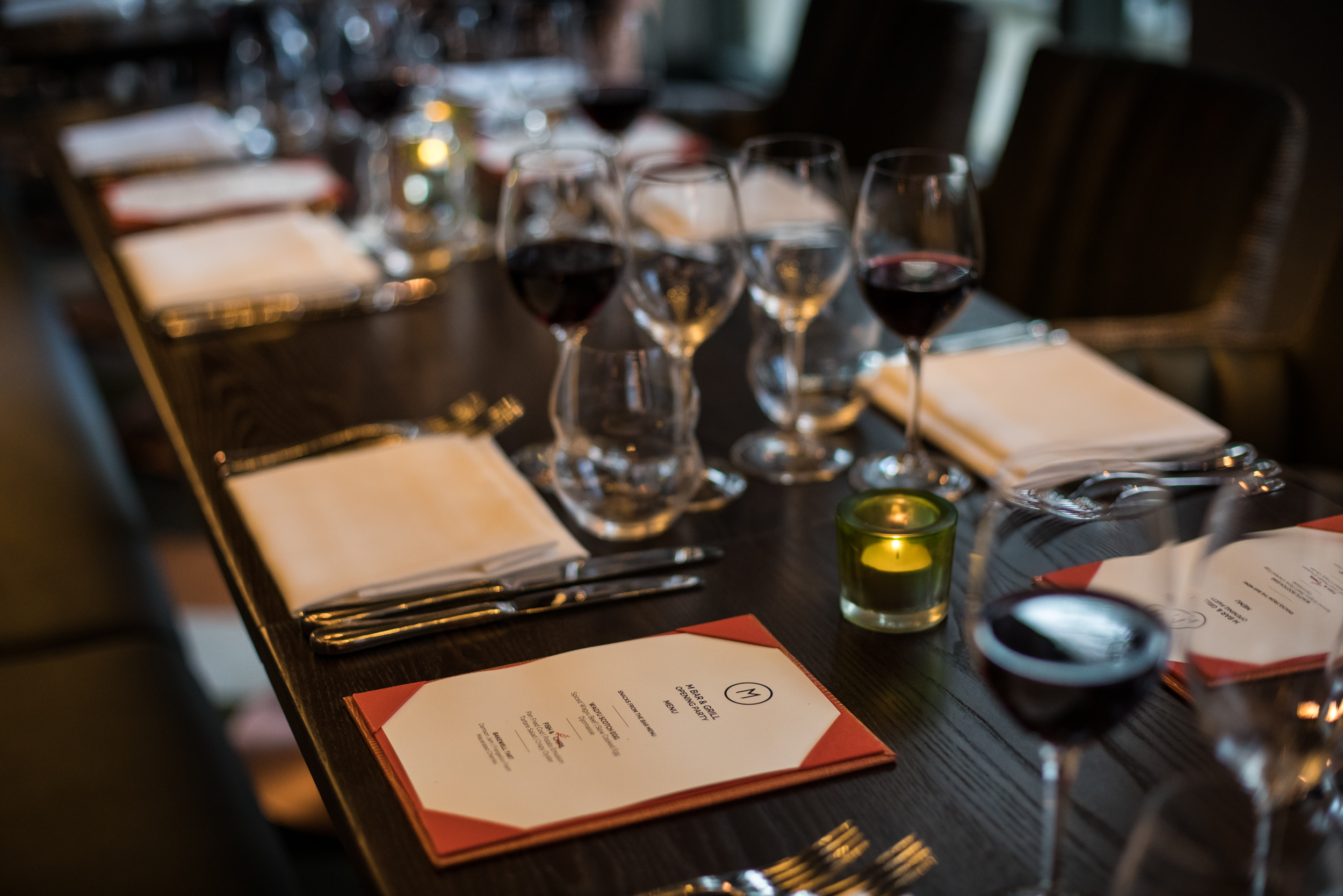 Elegant dining table setup at GRILL PDR for upscale corporate events and dinners.