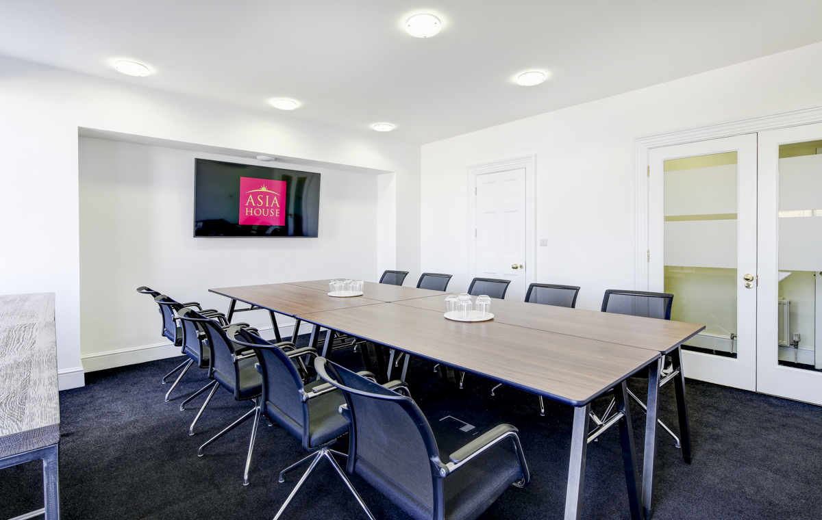 Modern conference room in Asia House with ergonomic chairs for corporate meetings.