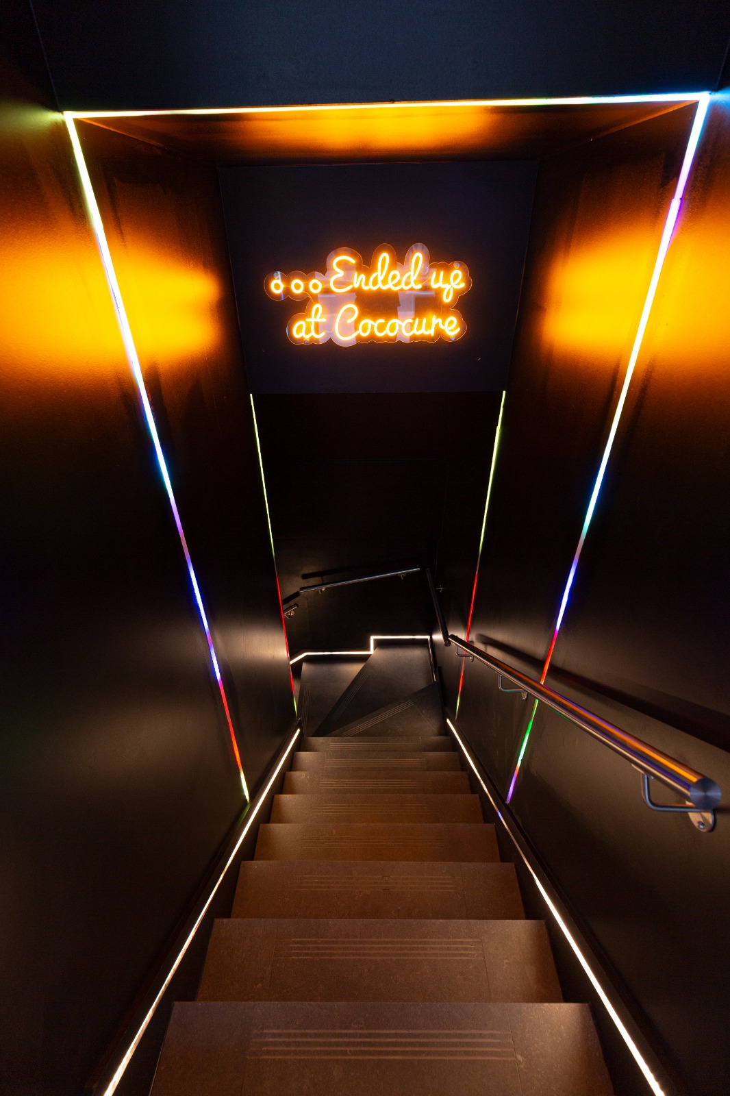 Stylish staircase at Cococure venue, ideal for upscale events and creative gatherings.