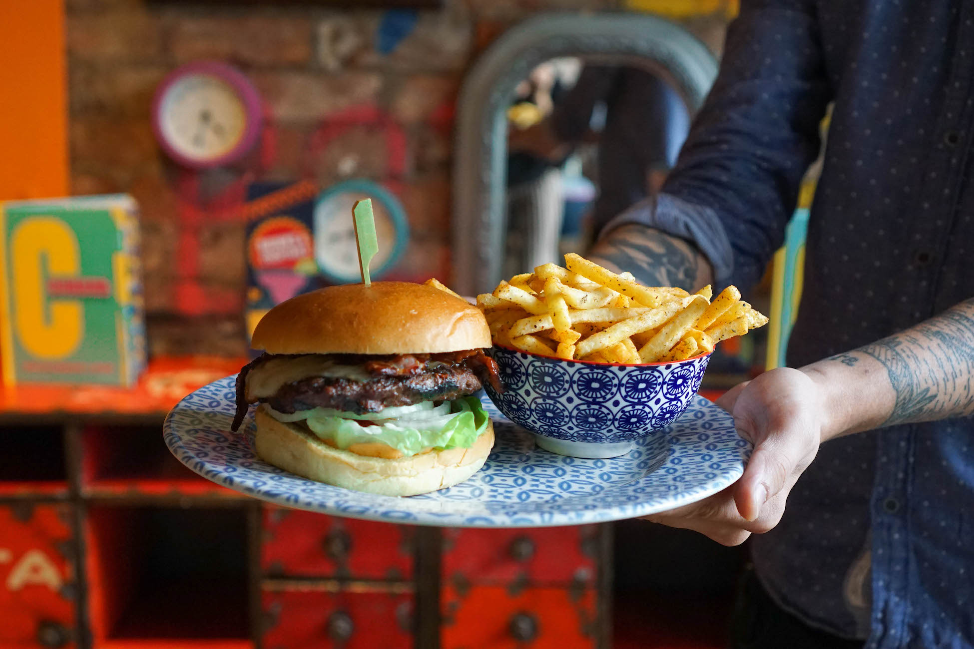 Vibrant burger and fries at Cabana Stratford, perfect for casual events and networking lunches.