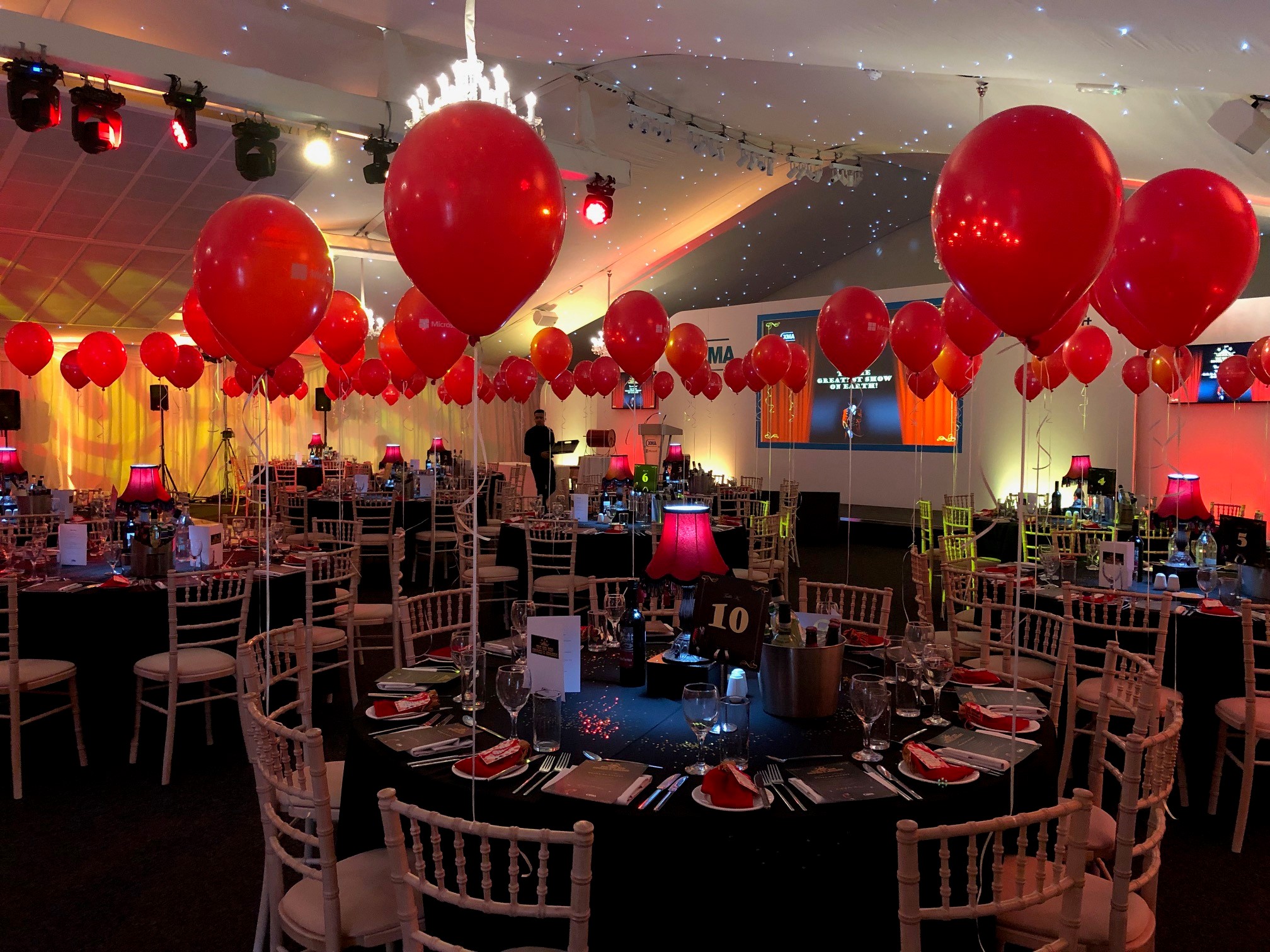 Garden Marquee at Hunton Park Hotel, elegant tables with red accents for celebrations.
