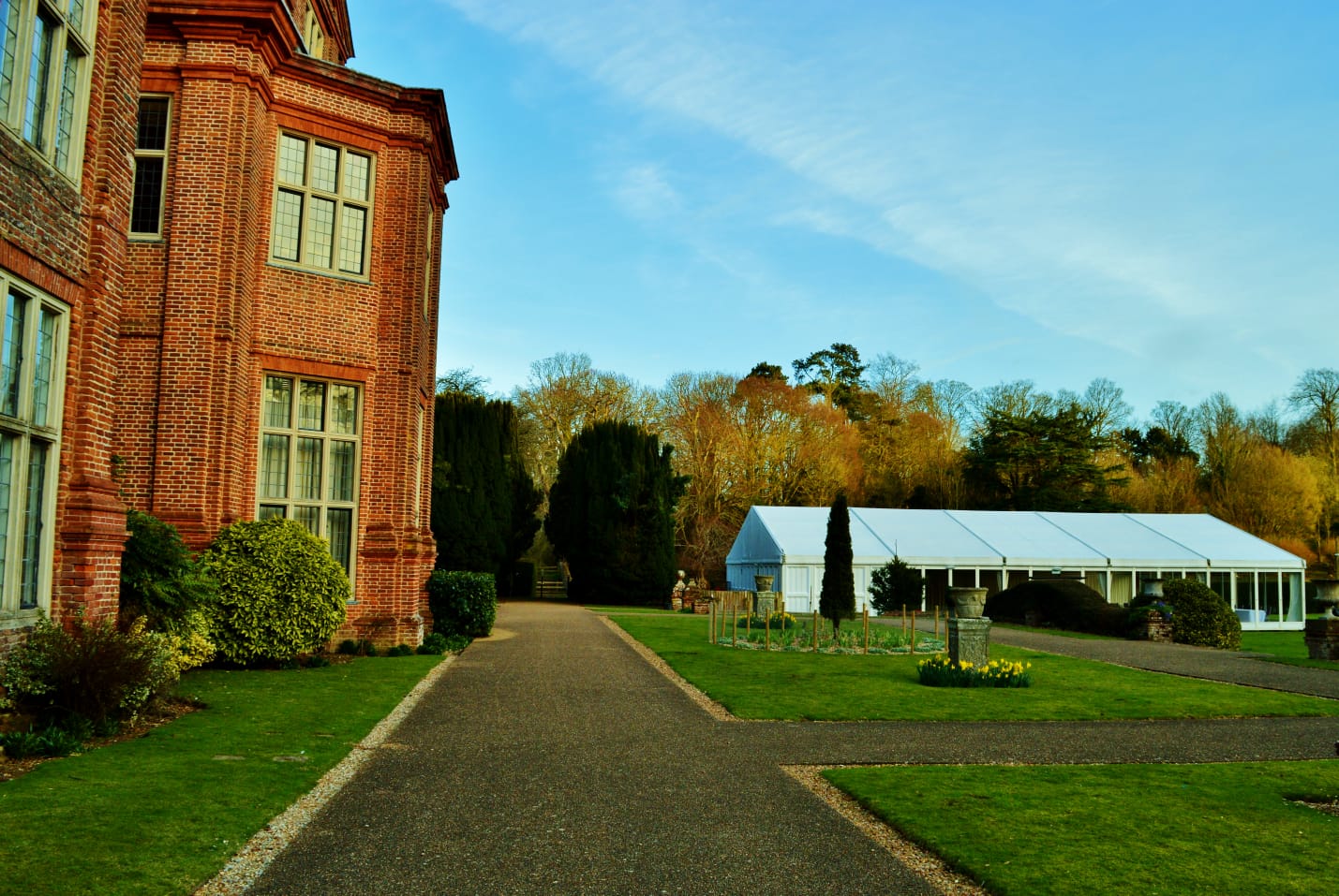 "Broome Park Hotel venue with historic building and marquee, ideal for weddings and events."