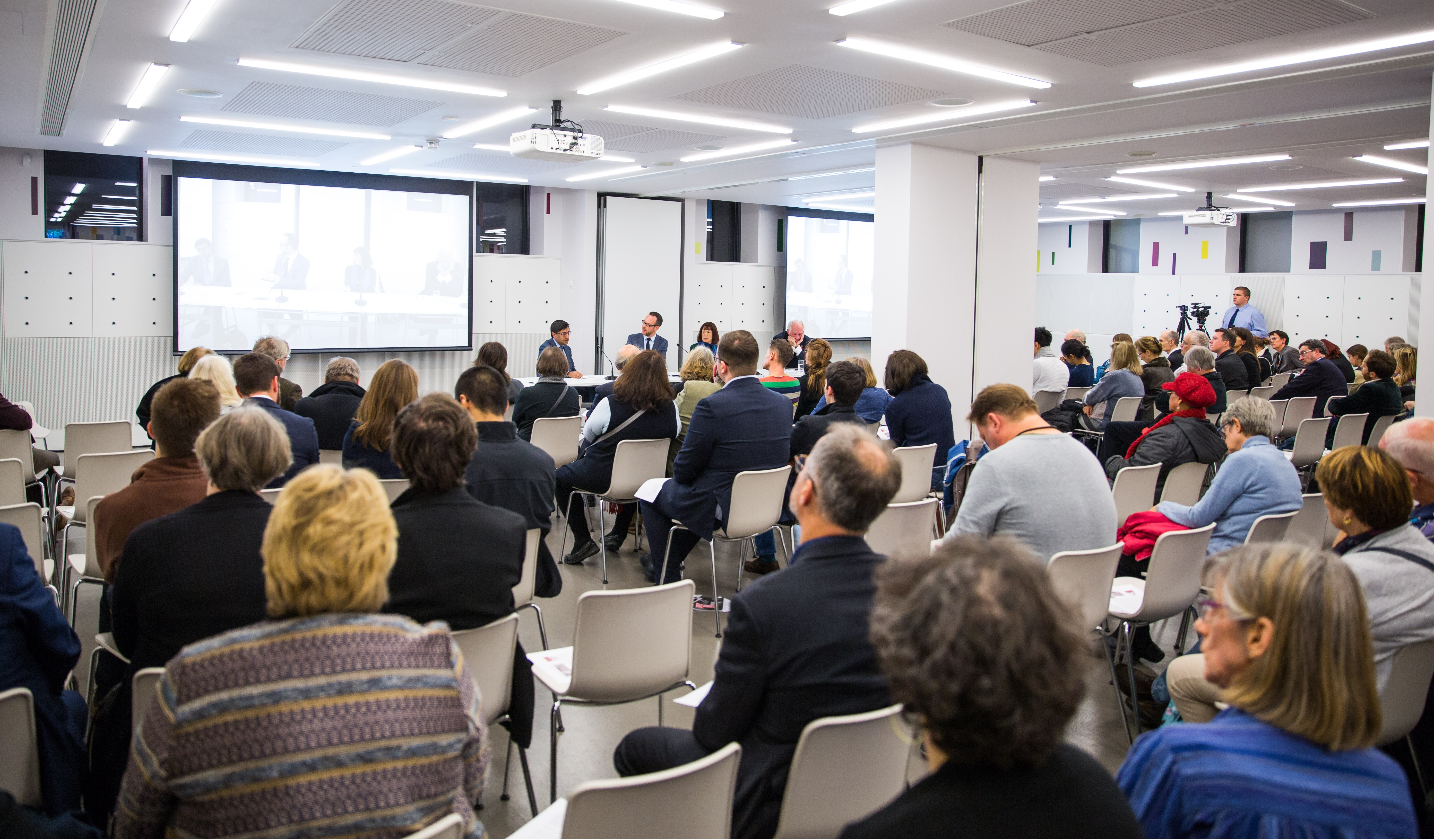 Panel discussion at Foyle Centre, National Army Museum; modern setup for networking event.