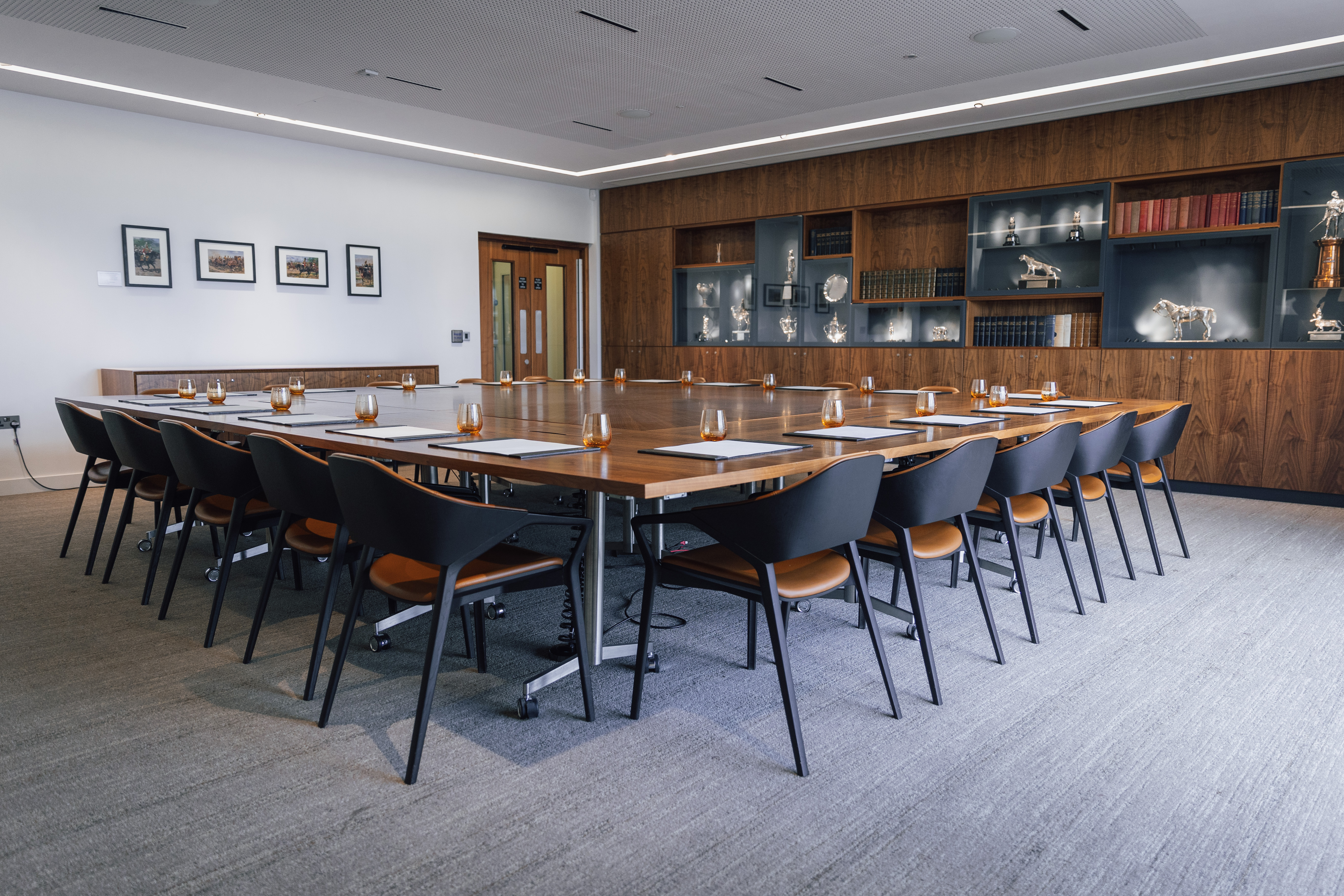 Modern conference room with wooden table for meetings at National Army Museum.