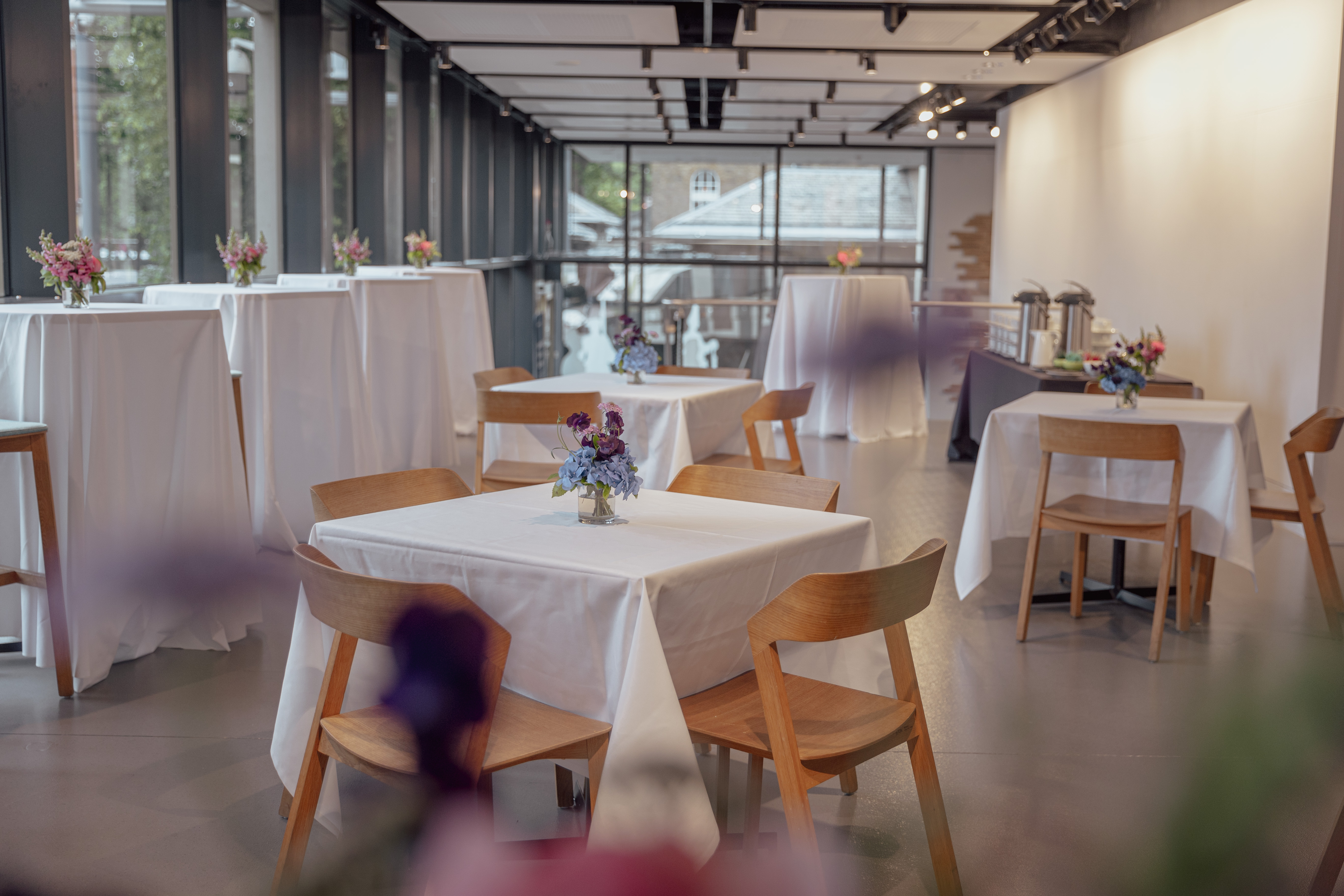 Modern event space in National Army Museum with elegant tables for gatherings.