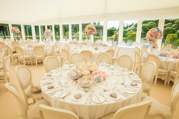 Elegant banquet setup with floral centerpieces at Hillsborough Castle for weddings.