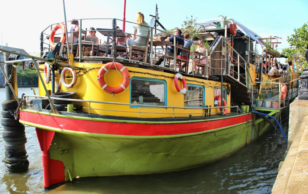 Vibrant boat venue at Tamesis Dock for unique events and gatherings.