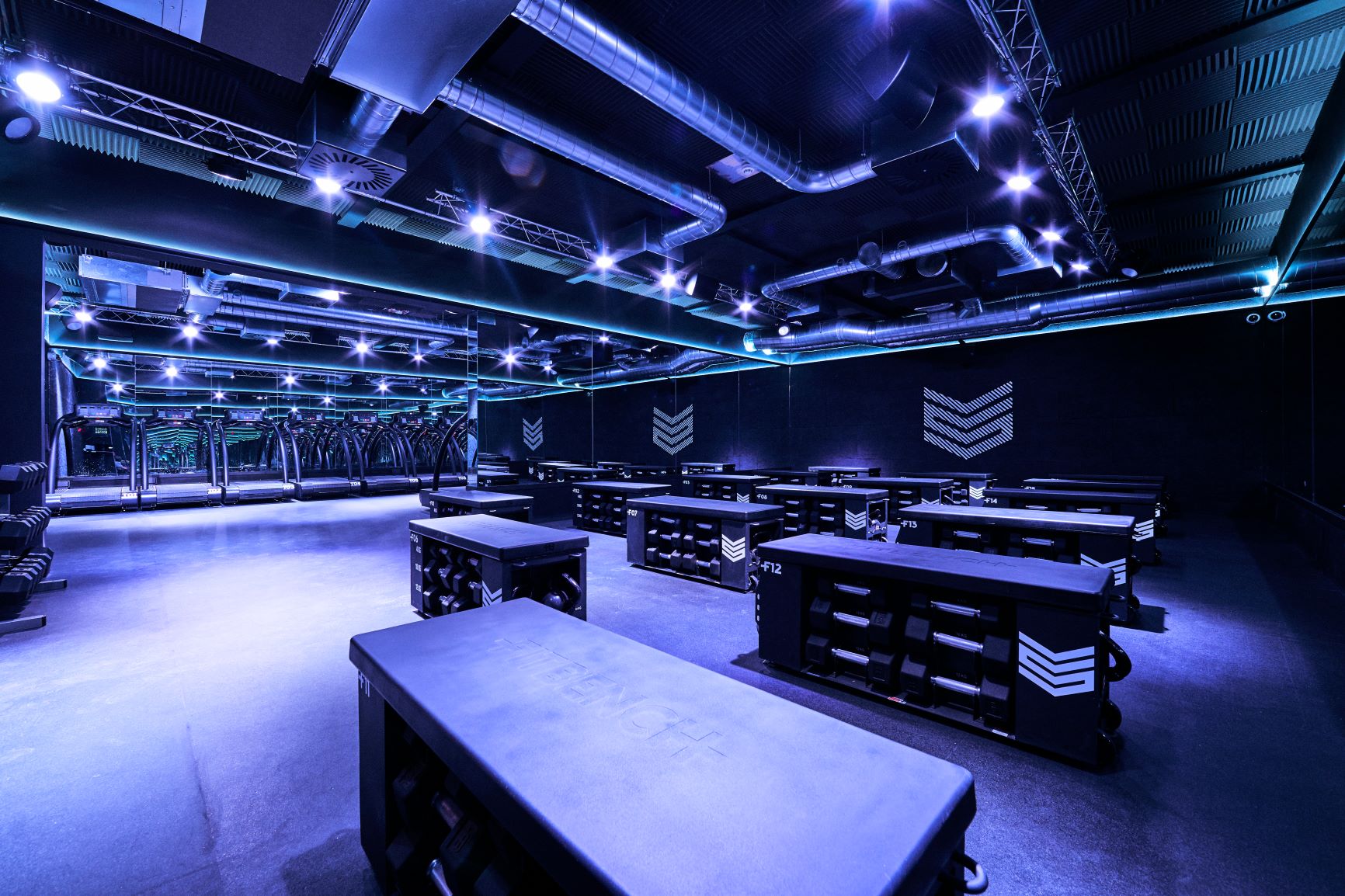 Modern event space with adaptable furniture for fitness events and workshops.