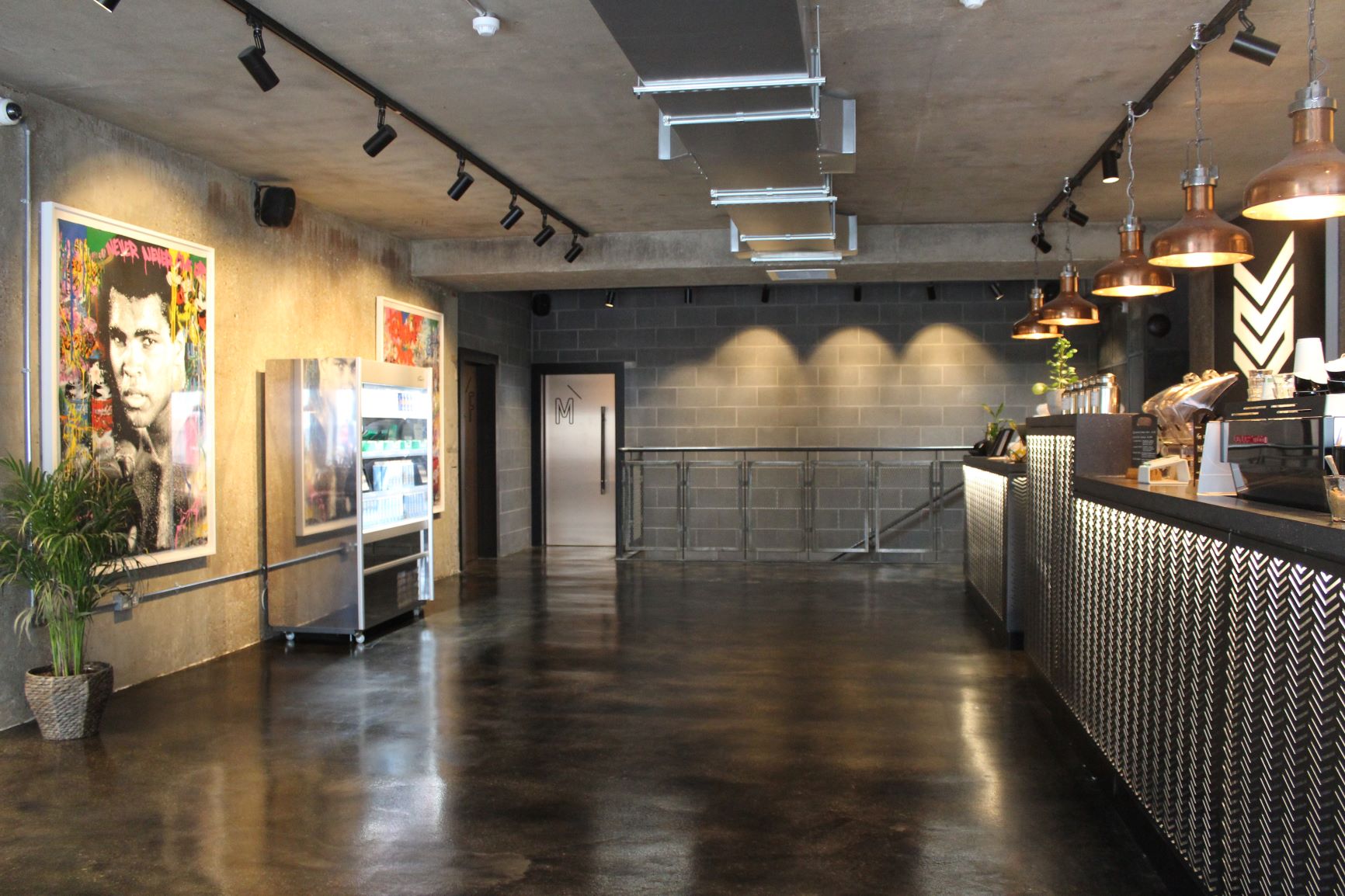 Modern event space with artistic decor, ideal for networking and gatherings.