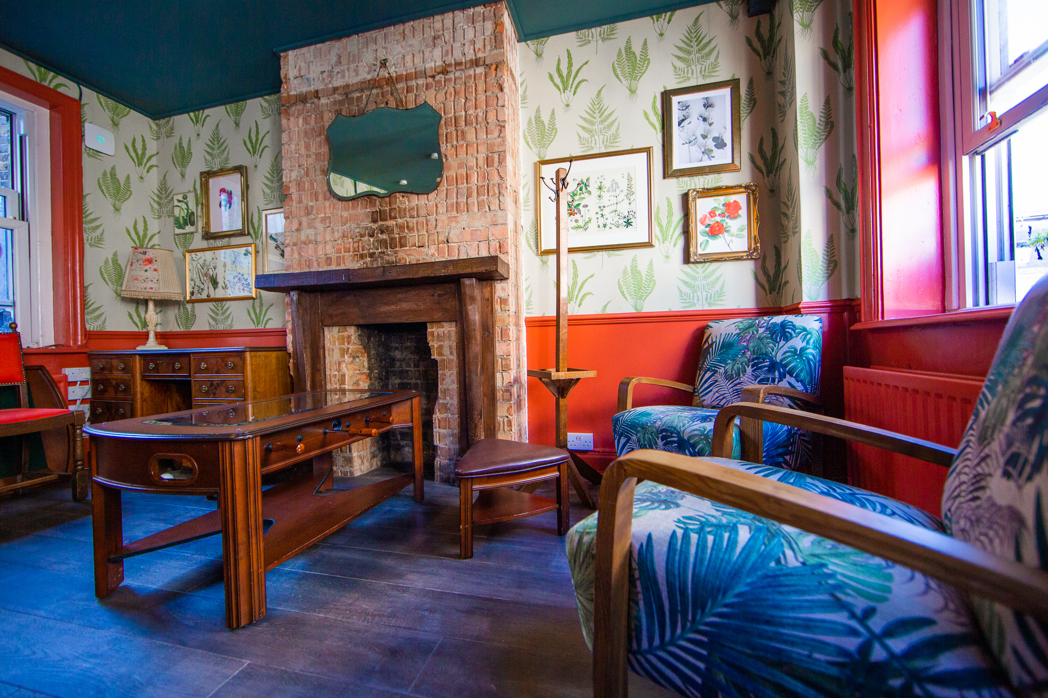 Cozy meeting space with fireplace at Bow Street Tavern for informal gatherings.