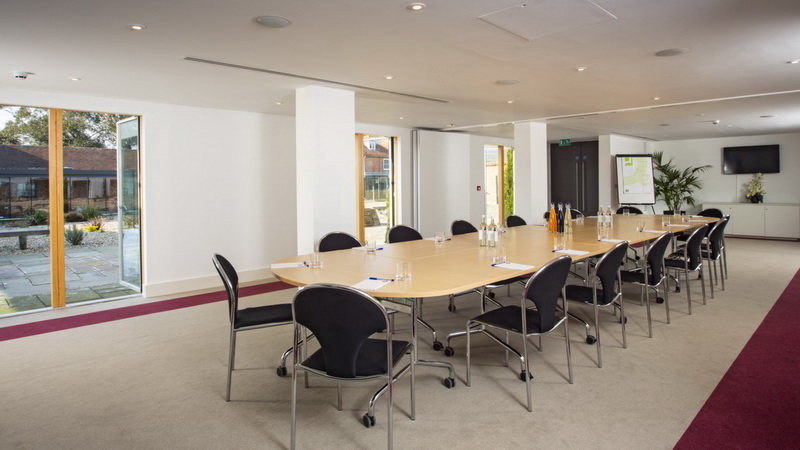 Thorpe Suite at Lifehouse Spa: modern meeting room with oval table for professional events.