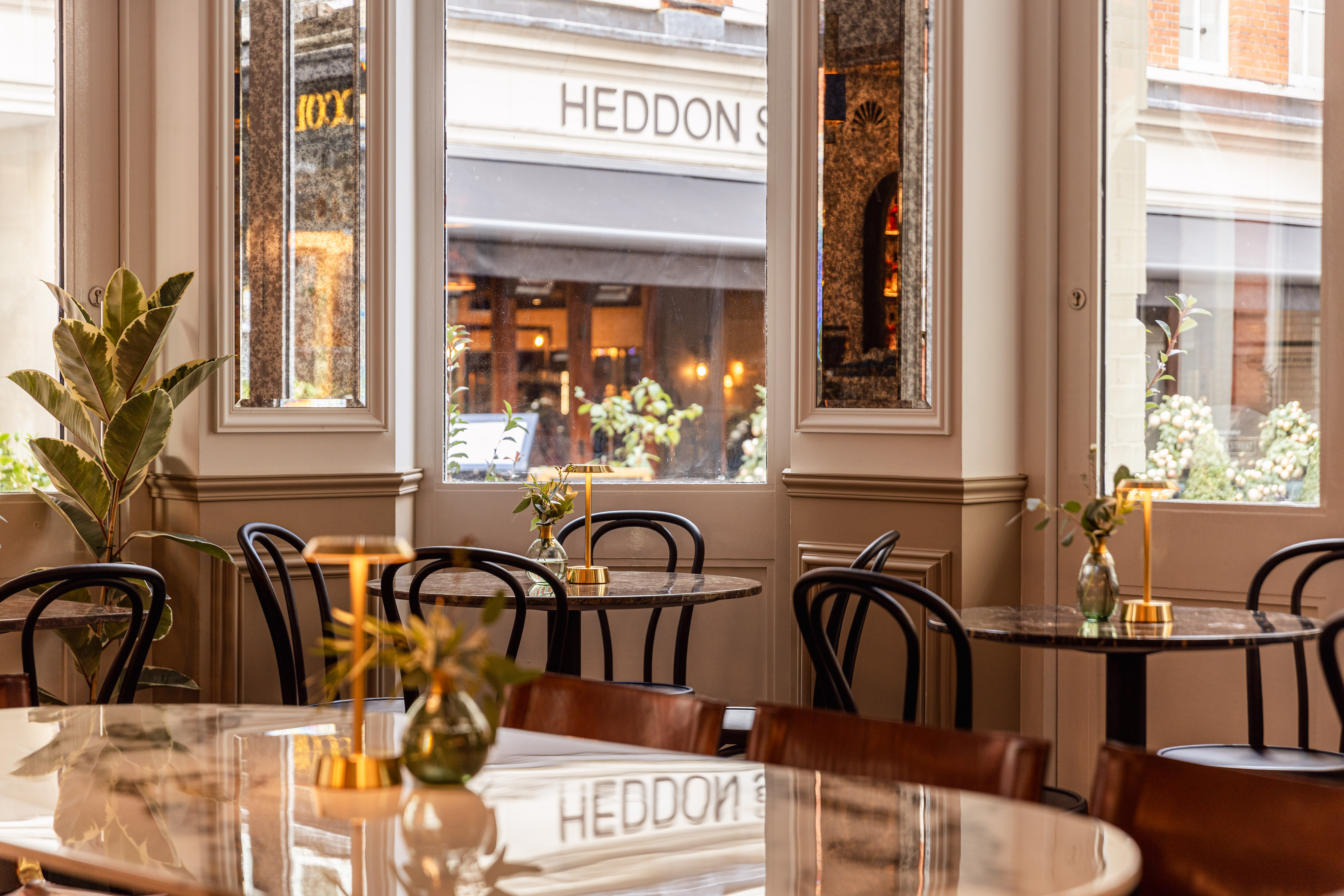 Stylish café venue with elegant décor, perfect for networking events and meetings.